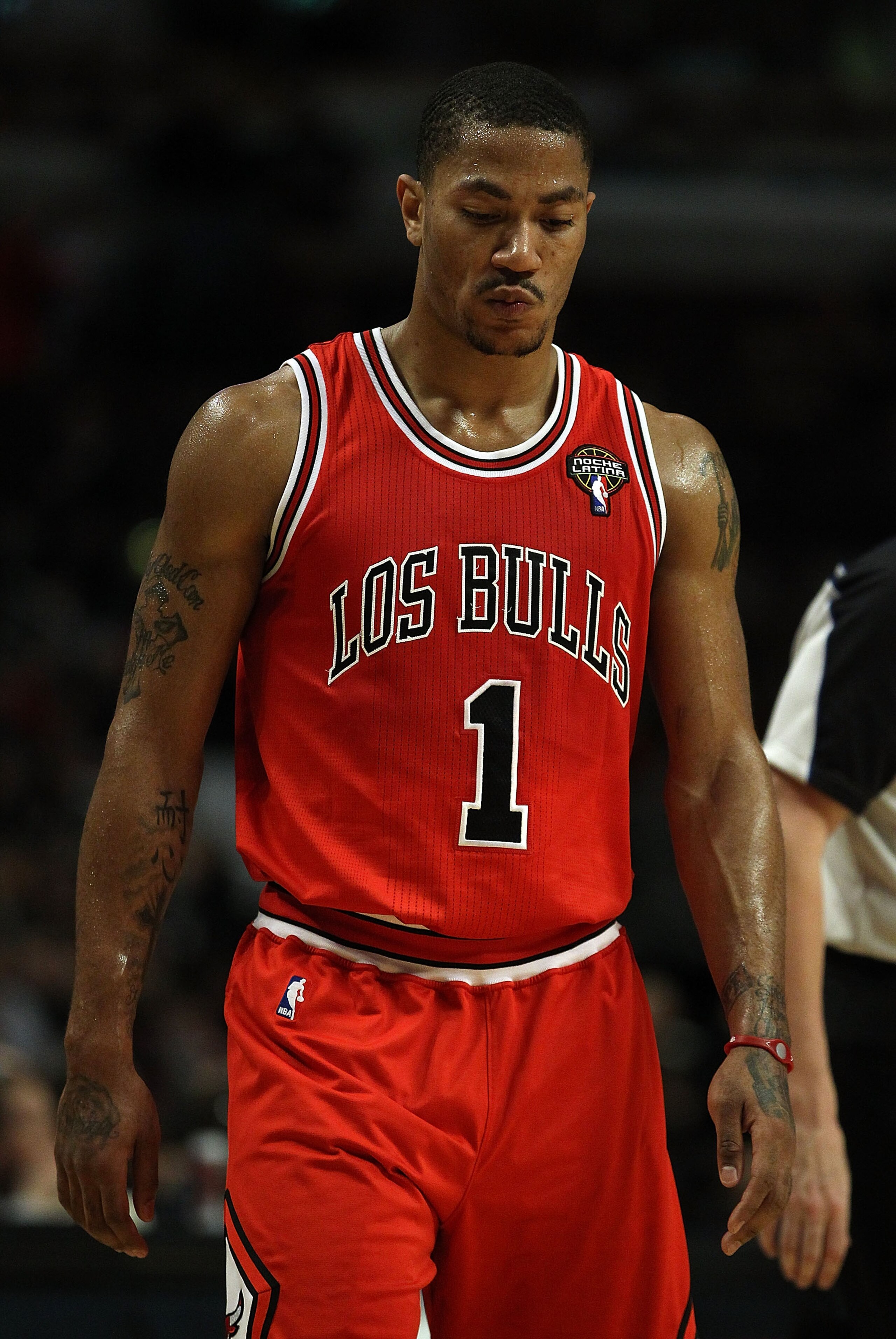 CHICAGO, IL - MARCH 28: Derrick Rose #1 of the Chicago Bulls reacts to a loss against the Philadelphia 76ers at the United Center on March 28, 2011 in Chicago, Illinois. The 76ers defeated the Bulls 97-85. NOTE TO USER: User expressly acknowledges and agr CHICAGO, IL - MARCH 28: Derrick Rose #1 of the Chicago Bulls reacts to a loss against the Philadelphia 76ers at the United Center on March 28, 2011 in Chicago, Illinois. The 76ers defeated the Bulls 97-85. NOTE TO USER: User expressly acknowledges and agr