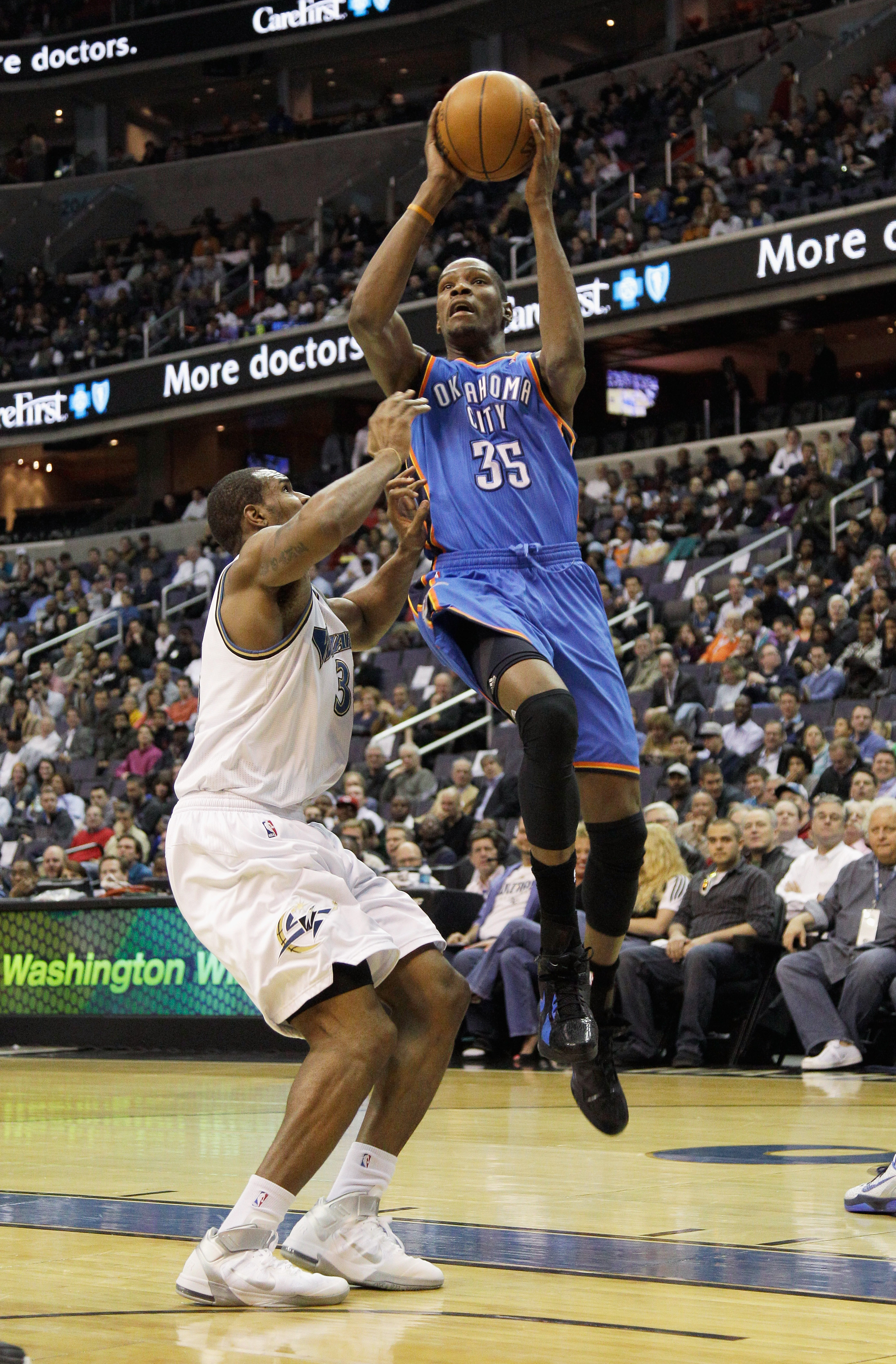WASHINGTON, DC - MARCH 14: Kevin Durant #35 of the Oklahoma City Thunder puts up a shot in front of Trevor Booker #35 of the Washington Wizards during the first half at the Verizon Center on March 14, 2011 in Washington, DC. NOTE TO USER: User expressly a
