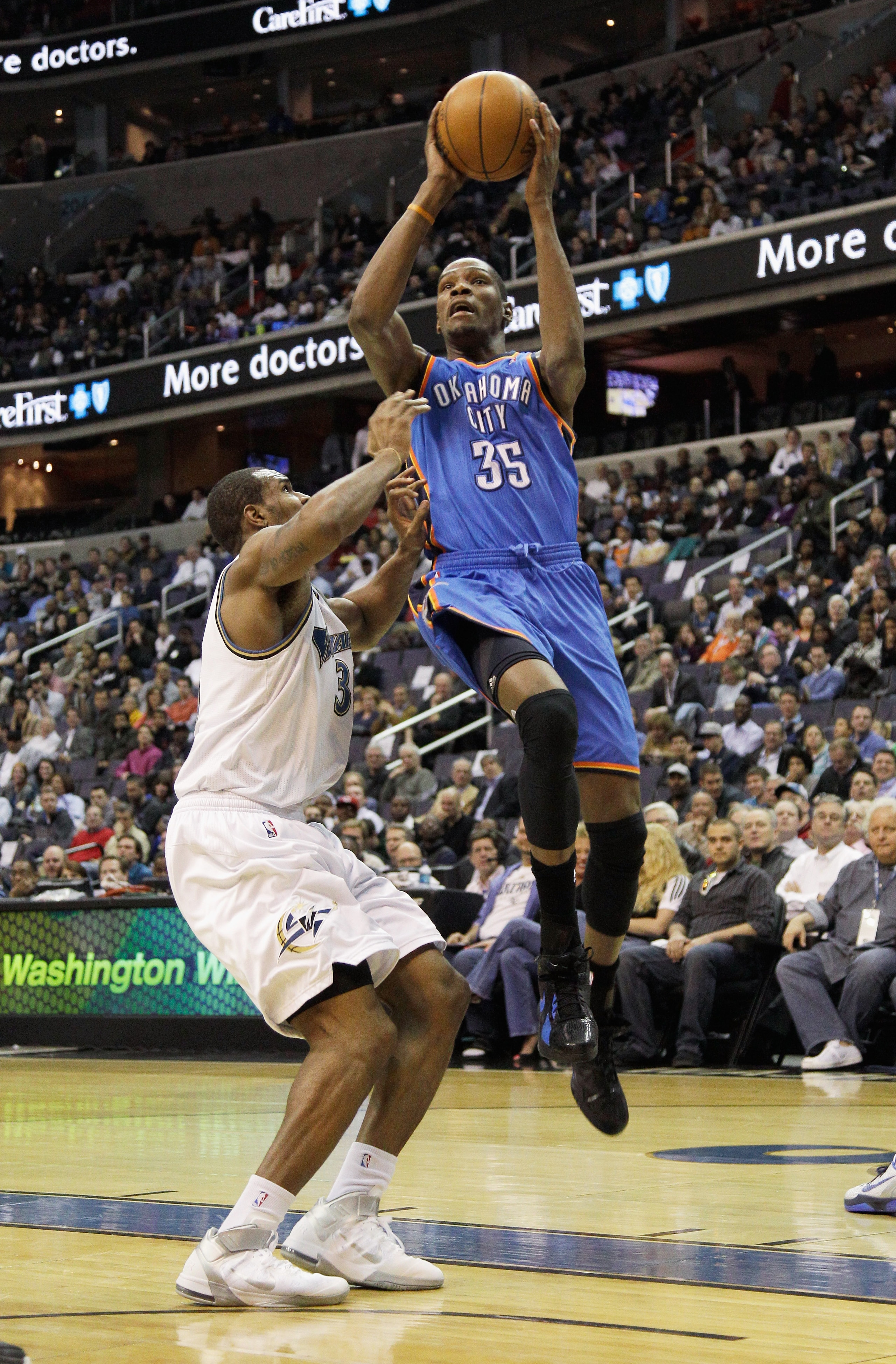 WASHINGTON, DC - MARCH 14: Kevin Durant #35 of the Oklahoma City Thunder puts up a shot in front of Trevor Booker #35 of the Washington Wizards during the first half at the Verizon Center on March 14, 2011 in Washington, DC. NOTE TO USER: User expressly a WASHINGTON, DC - MARCH 14: Kevin Durant #35 of the Oklahoma City Thunder puts up a shot in front of Trevor Booker #35 of the Washington Wizards during the first half at the Verizon Center on March 14, 2011 in Washington, DC. NOTE TO USER: User expressly a