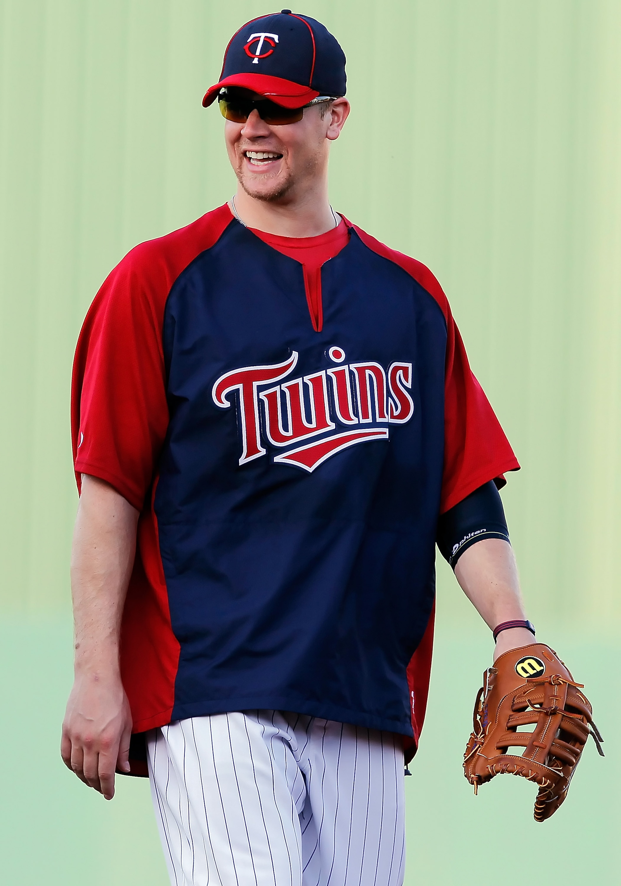 FORT MYERS, FL - FEBRUARY 27:  First baseman Justin Morneau #33 of the Minnesota Twins smiles just before the start of the Grapefruit League Spring Training Game against the Boston Red Sox at Hammond Stadium on February 27, 2011 in Fort Myers, Florida.  (