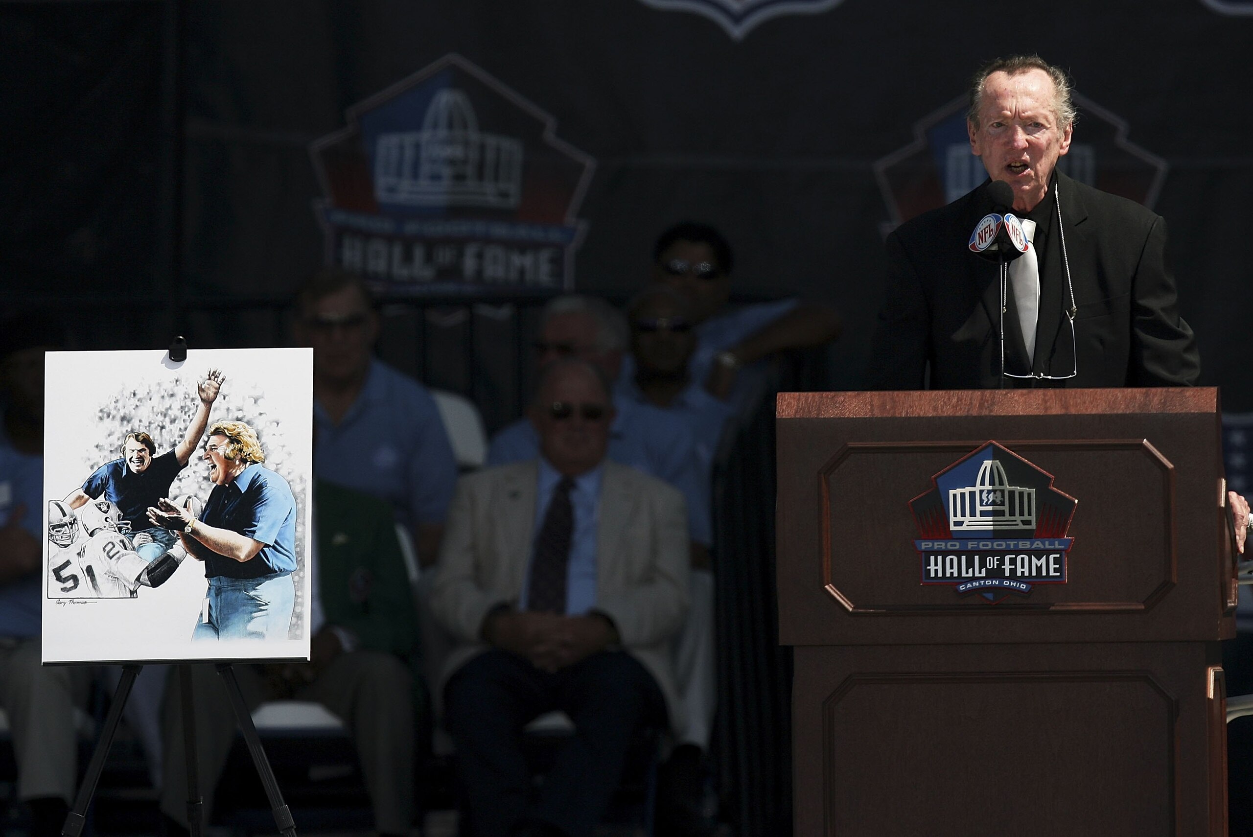 CANTON, OH - AUGUST 5: Oakland Raiders owner Al Davis speaks while presenting for inductee and former Raider coach John Madden during the Class of 2006 Pro Football Hall of Fame Enshrinement Ceremony at Fawcett Stadium on August 5, 2006 in Canton, Ohio. (