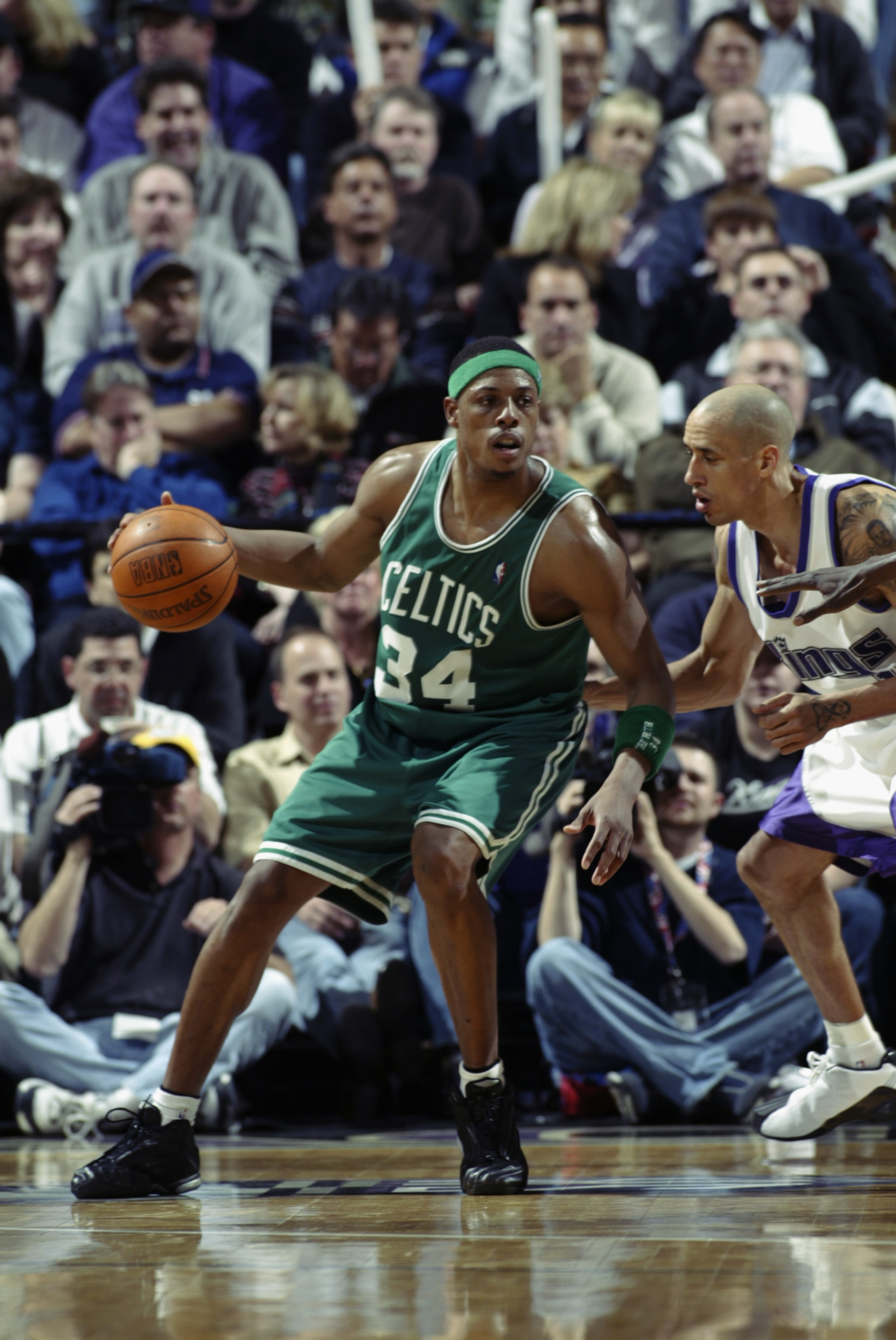 SACRAMENTO, CA - FEBRUARY 20:  Paul Pierce #34 of the Boston Celtics is defended by Doug Christie #13 of the Sacramento Kings during the NBA game at Arco Arena on February 20, 2003 in Sacramento, California.  The Kings won 105-83.  NOTE TO USER: User expr