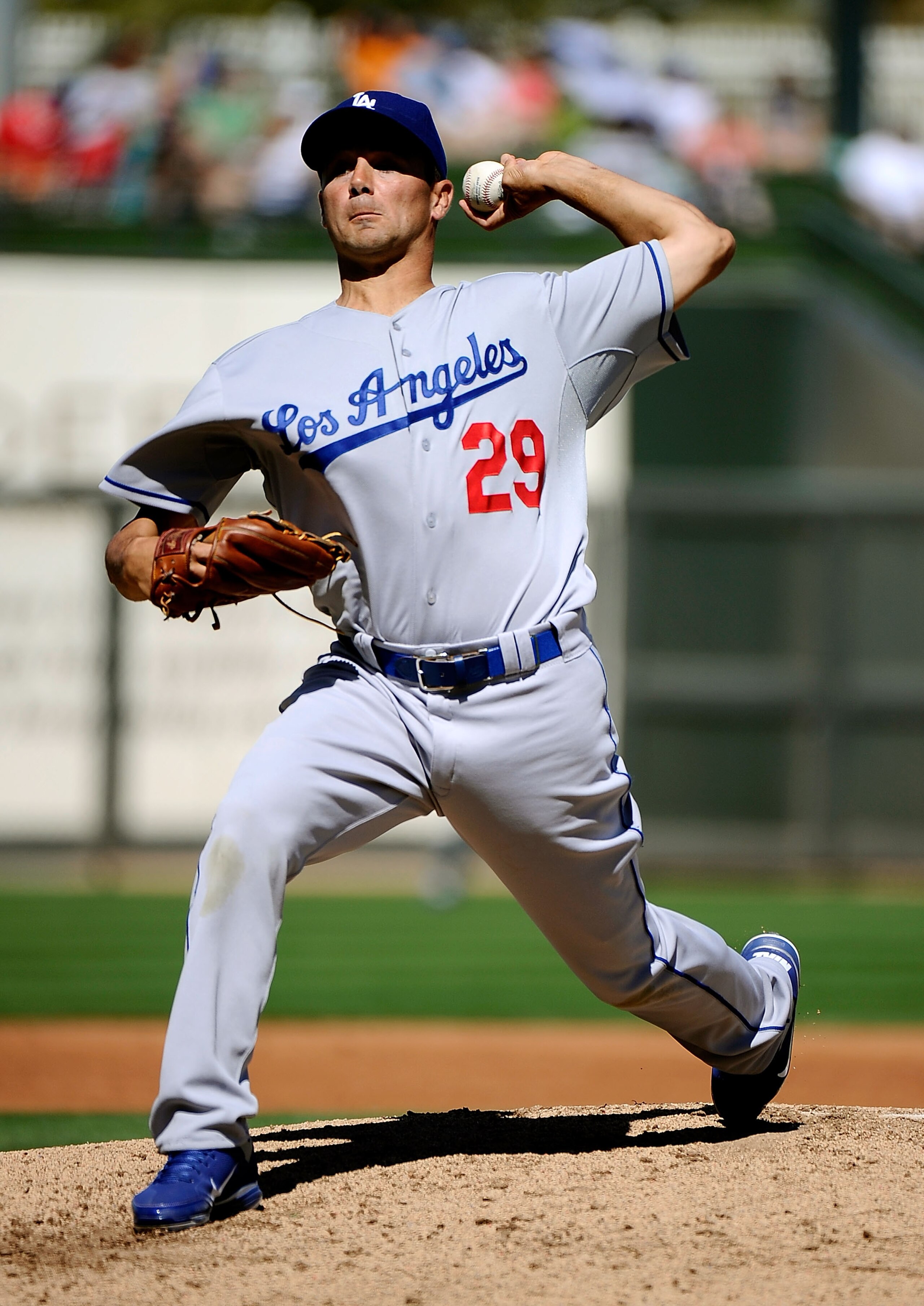 SURPRISE, AZ - MARCH 12:  Pitcher Ted Lilly #29 of the the Los Angeles Dodgers  throws a pitch during the spring training baseball game against the Kansas City Royals at Surprise Stadium on March 12, 2011 in Surprise, Arizona.  (Photo by Kevork Djansezian