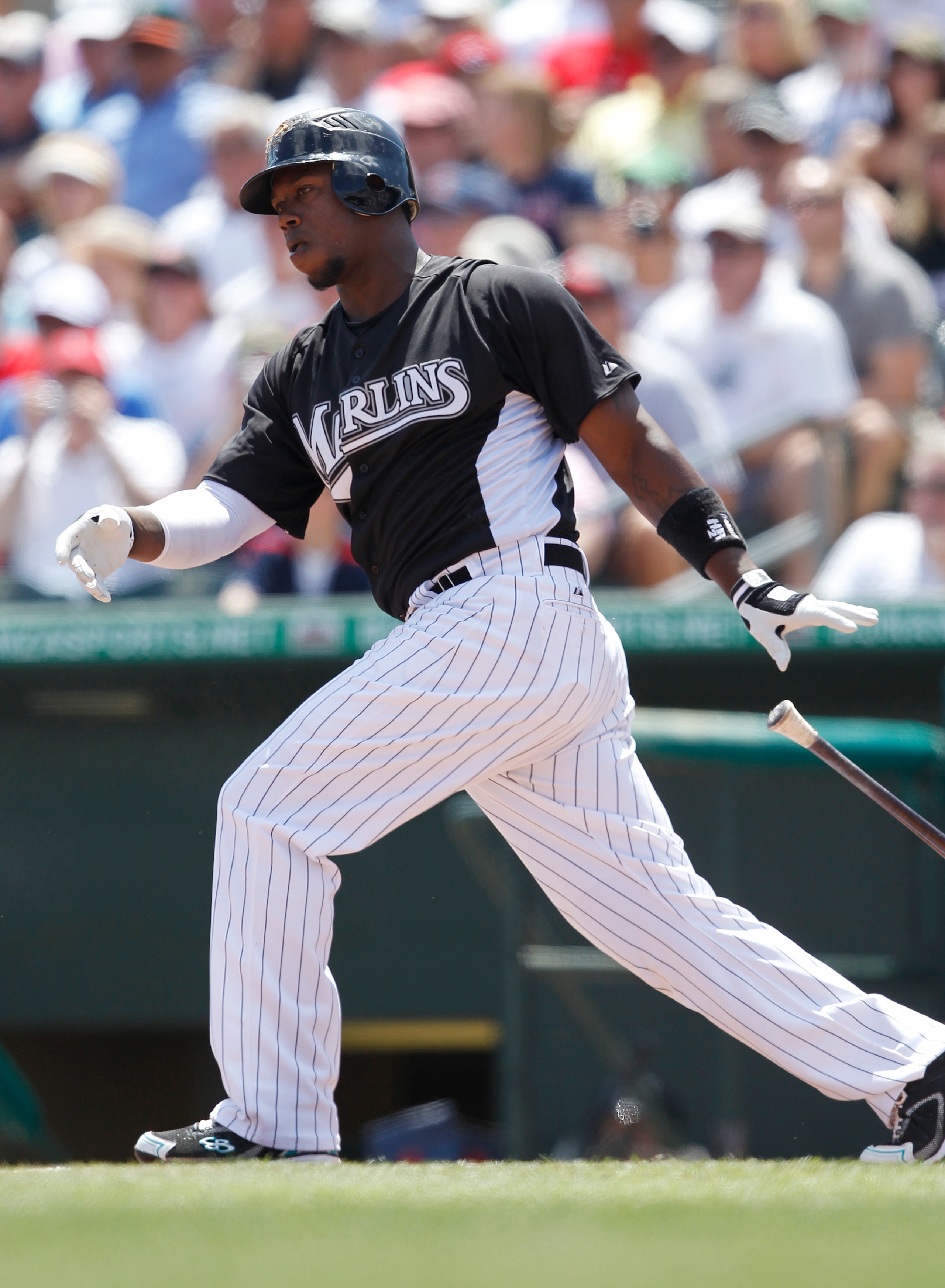 JUPITER, FL - MARCH 24: Hanley Ramirez #2 of the Florida Marlins hits a single against the Boston Red Sox in the first inning at Roger Dean Stadium on March 24, 2011 in Jupiter, Florida. (Photo by Joel Auerbach/Getty Images)