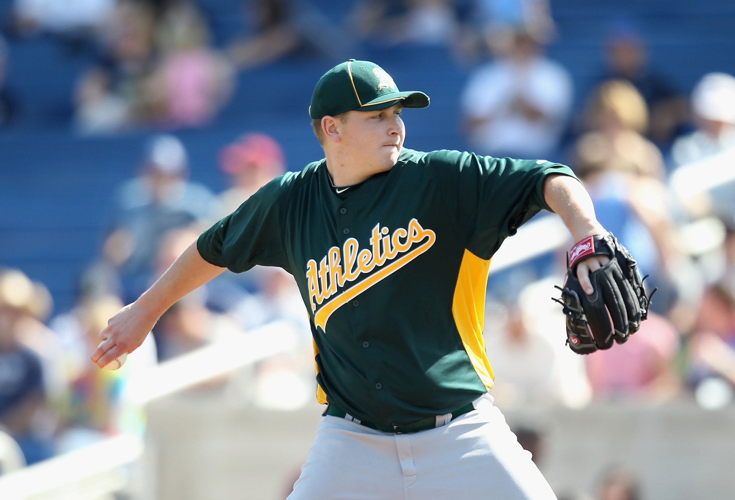 PHOENIX, AZ - MARCH 03:  Starting pitcher Trevor Cahill #53 of the Oakland Athletics pitches against the Milwaukee Brewers during the spring training game at Maryvale Baseball Park on March 3, 2011 in Phoenix, Arizona.  (Photo by Christian Petersen/Getty