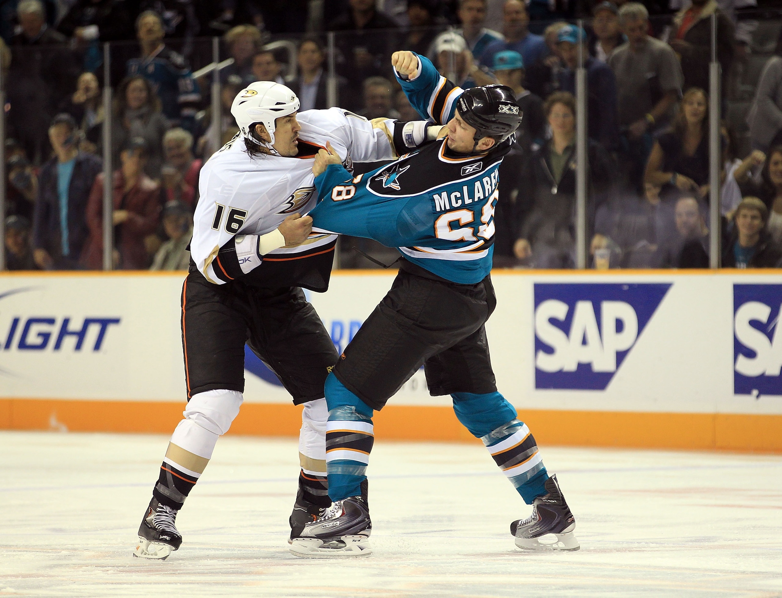 SAN JOSE, CA - NOVEMBER 09:  George Parros #16 of the Anaheim Ducks fights with Frazer McLaren #68 of the San Jose Sharks at HP Pavilion on November 9, 2010 in San Jose, California.  (Photo by Ezra Shaw/Getty Images)