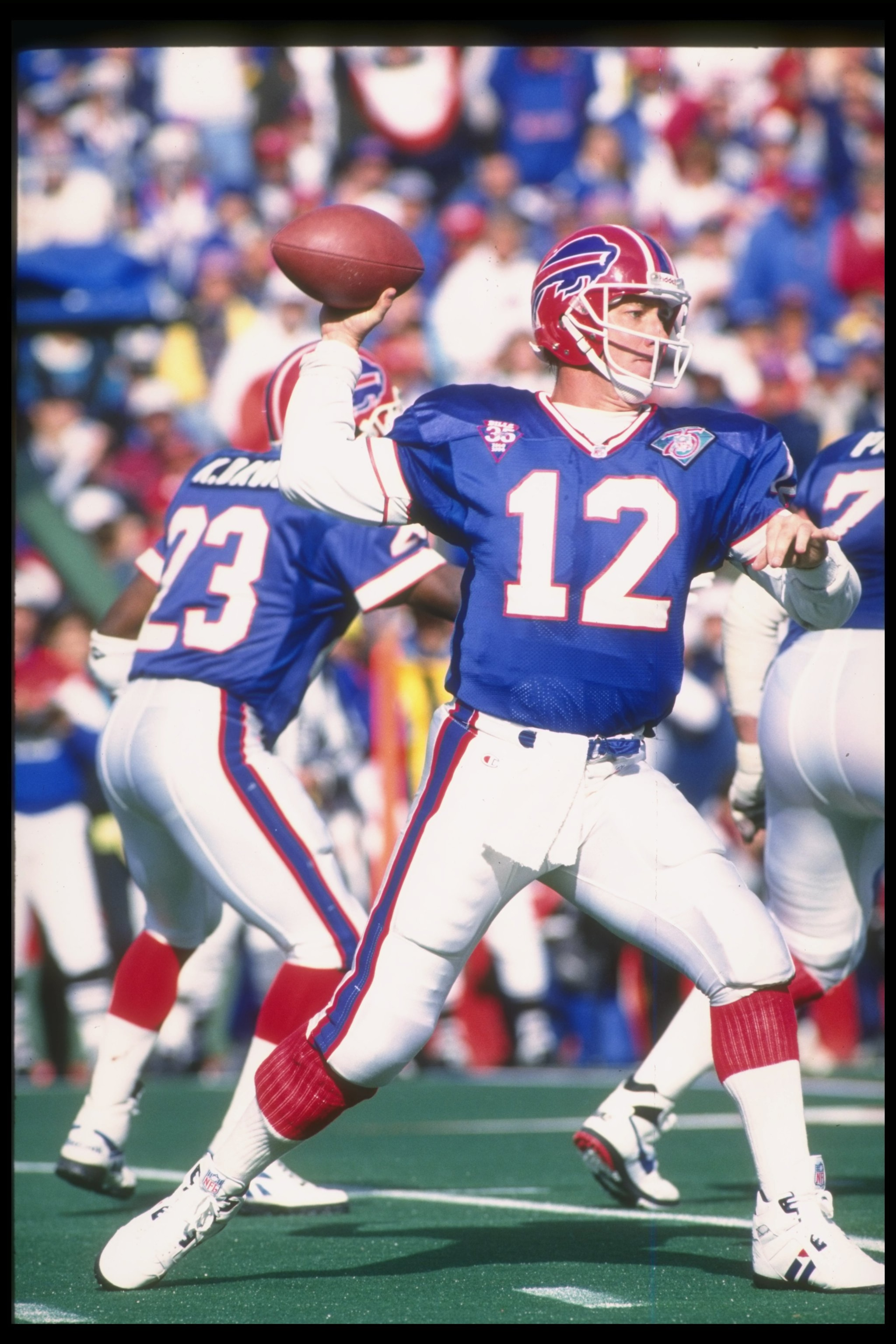 9 Oct 1994: Quarterback Jim Kelly of the Buffalo Bills throws the ball during a game against the Miami Dolphins at Rich Stadium in Orchard Park, New York. The Bills won the game, 21-11.