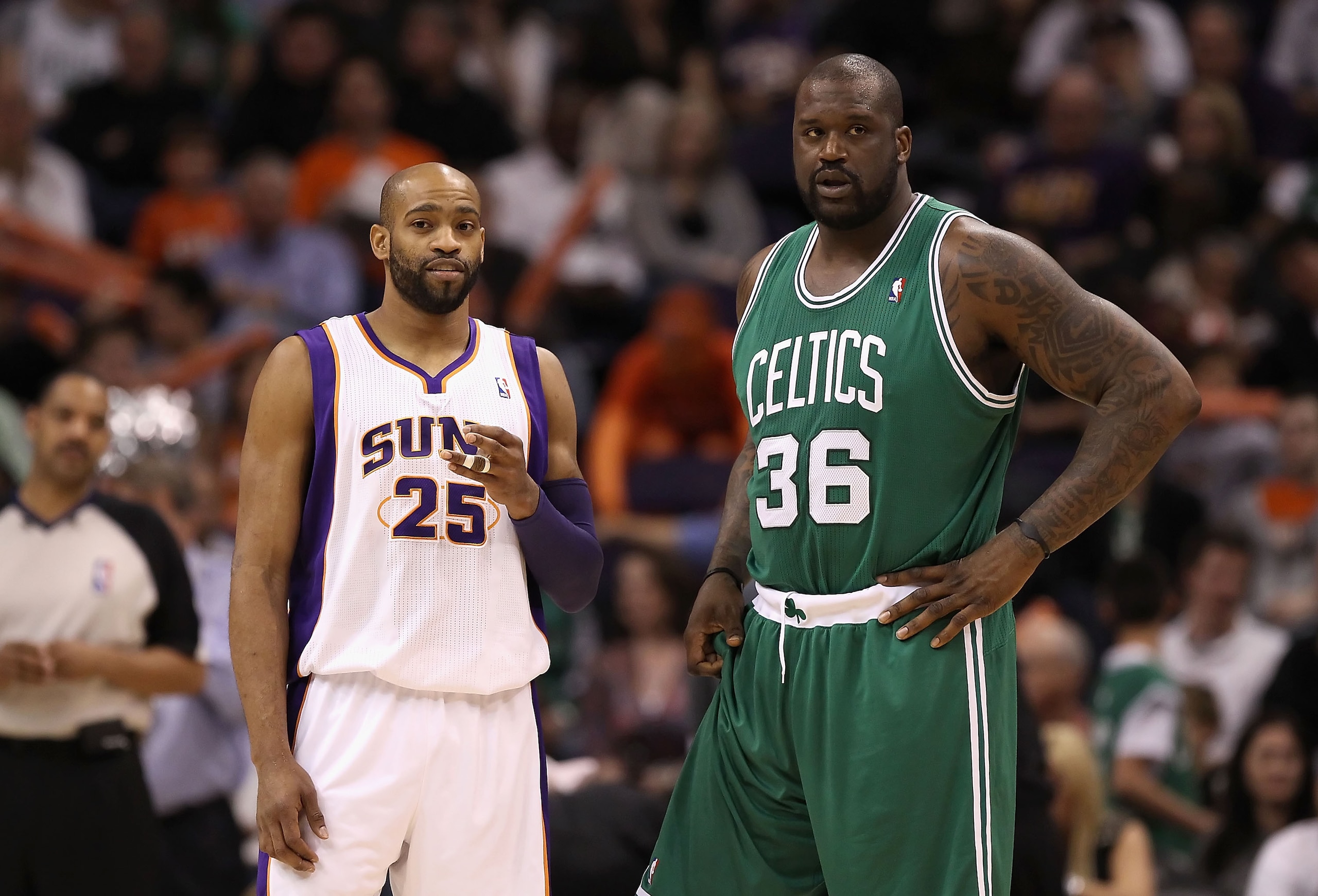 PHOENIX, AZ - JANUARY 28:  Vince Carter #25 of the Phoenix Suns and Shaquille O'Neal #36 of the Boston Celtics during the NBA game at US Airways Center on January 28, 2011 in Phoenix, Arizona.  The Suns defeated the Celtics 88-71.  NOTE TO USER: User expr