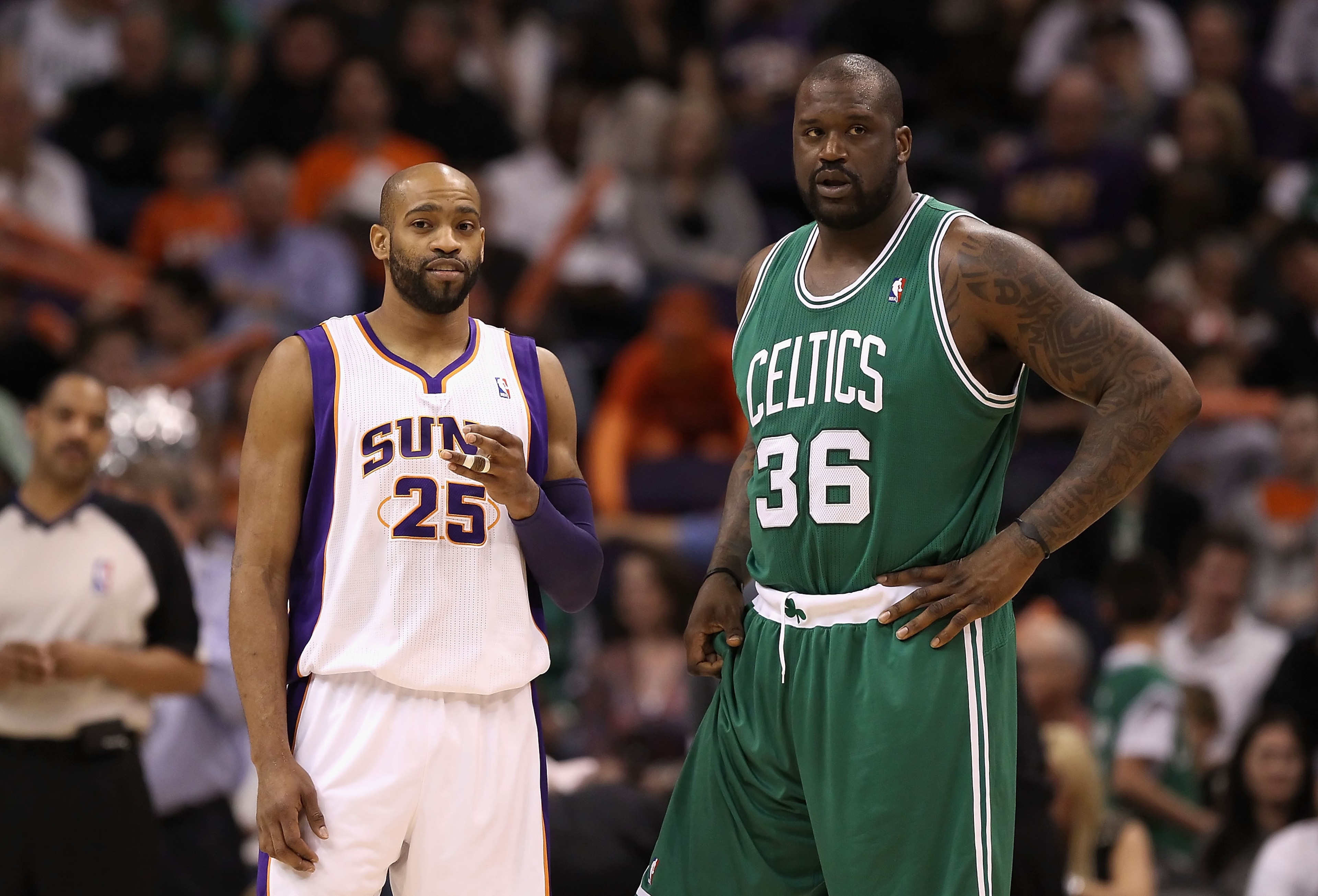 PHOENIX, AZ - JANUARY 28:  Vince Carter #25 of the Phoenix Suns and Shaquille O'Neal #36 of the Boston Celtics during the NBA game at US Airways Center on January 28, 2011 in Phoenix, Arizona.  The Suns defeated the Celtics 88-71.  NOTE TO USER: User expr