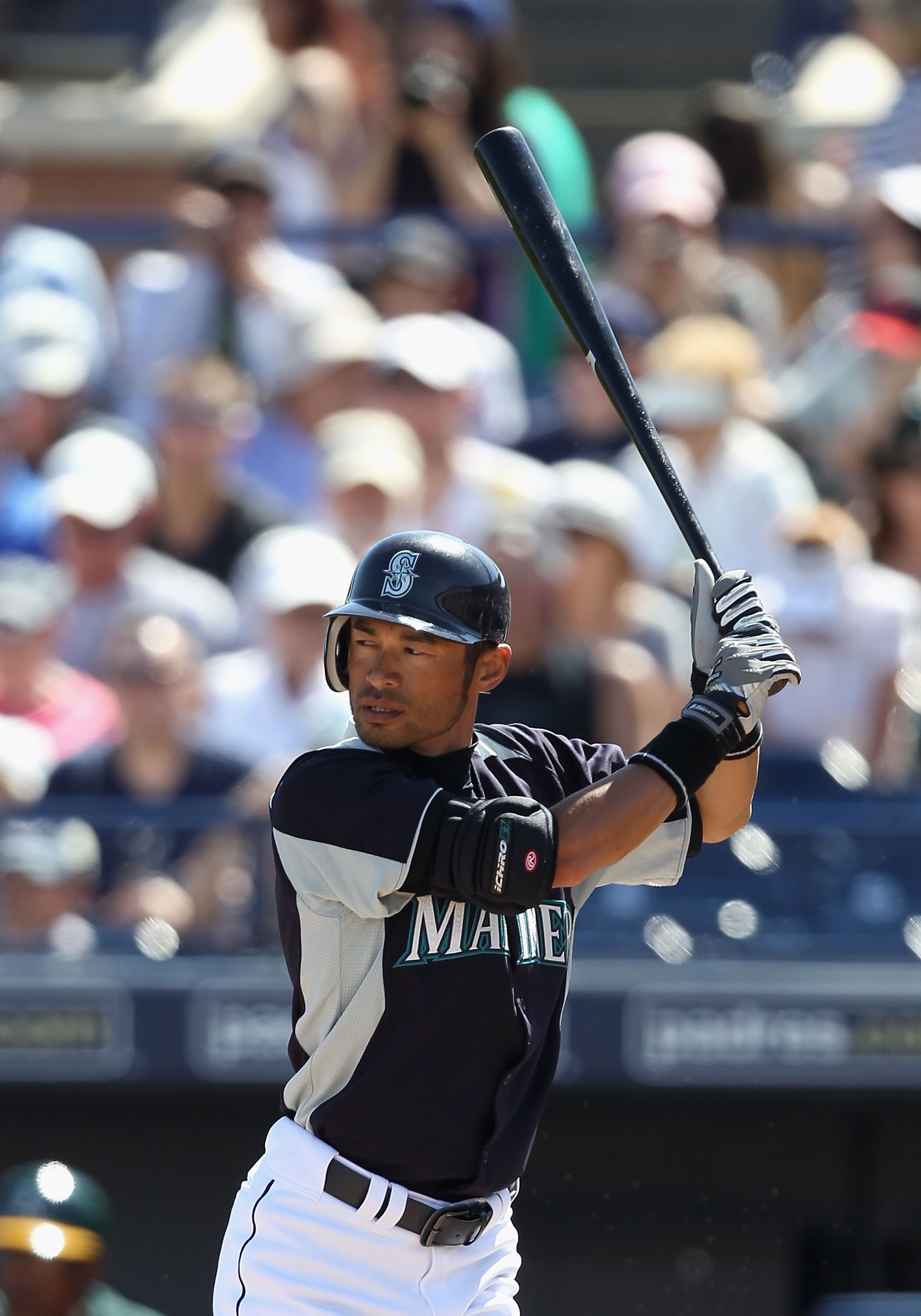 PEORIA, AZ - MARCH 12:  Ichiro Suzuki #51 of the Seattle Mariners bats against the Oakland Athletics during the spring training game at Peoria Stadium on March 12, 2011 in Peoria, Arizona.  (Photo by Christian Petersen/Getty Images)