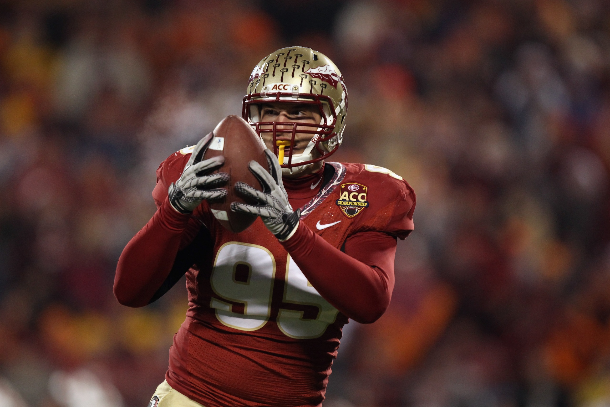 CHARLOTTE, NC - DECEMBER 04:  Bjoern Werner #95 of the Florida State Seminoles against the Virginia Tech Hokies during their game at Bank of America Stadium on December 4, 2010 in Charlotte, North Carolina.  (Photo by Streeter Lecka/Getty Images)