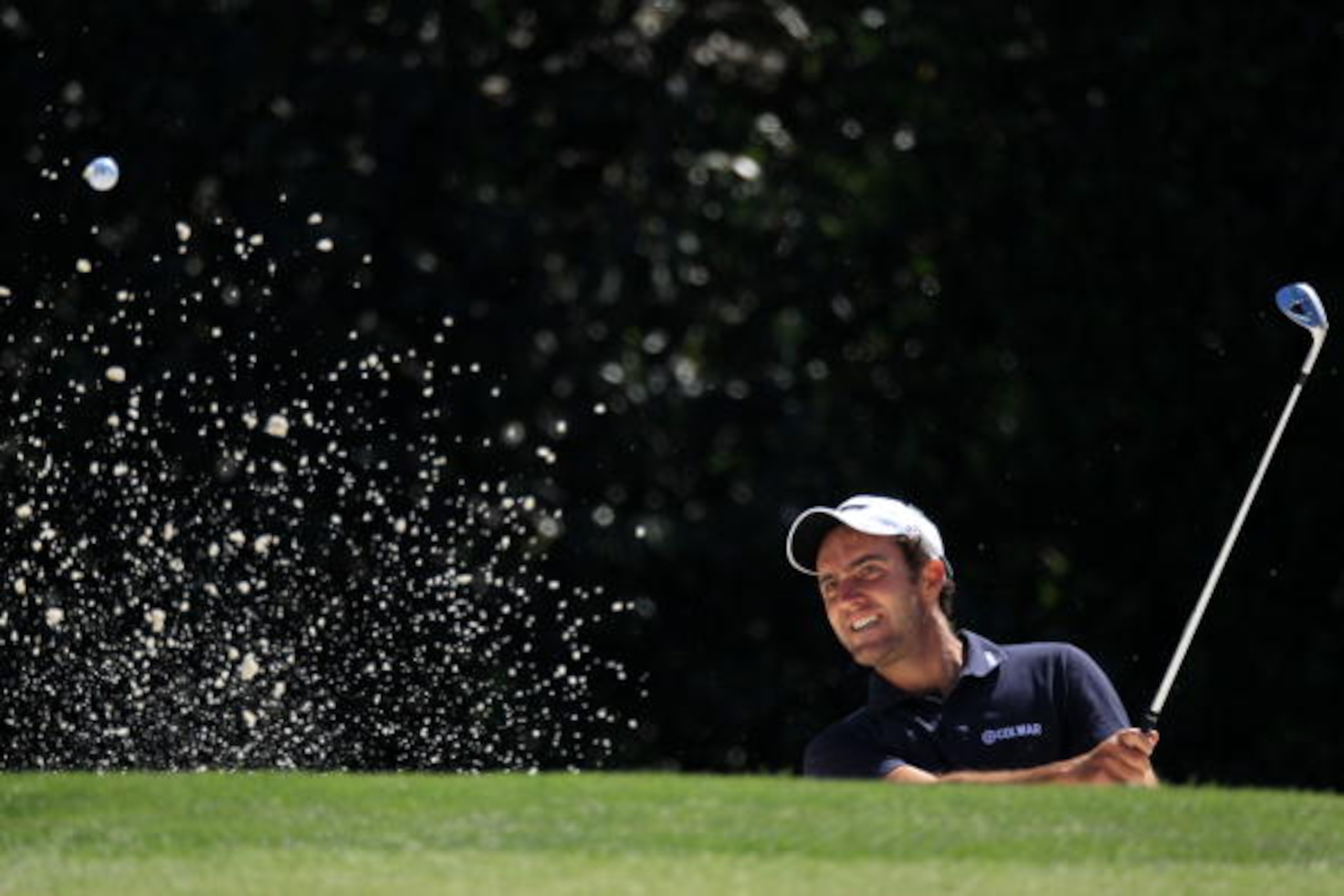 AUGUSTA, GA - APRIL 09:  Edoardo Molinari of Italy plays from a bunker on the fifth hole during the second round of the 2010 Masters Tournament at Augusta National Golf Club on April 9, 2010 in Augusta, Georgia.  (Photo by David Cannon/Getty Images)