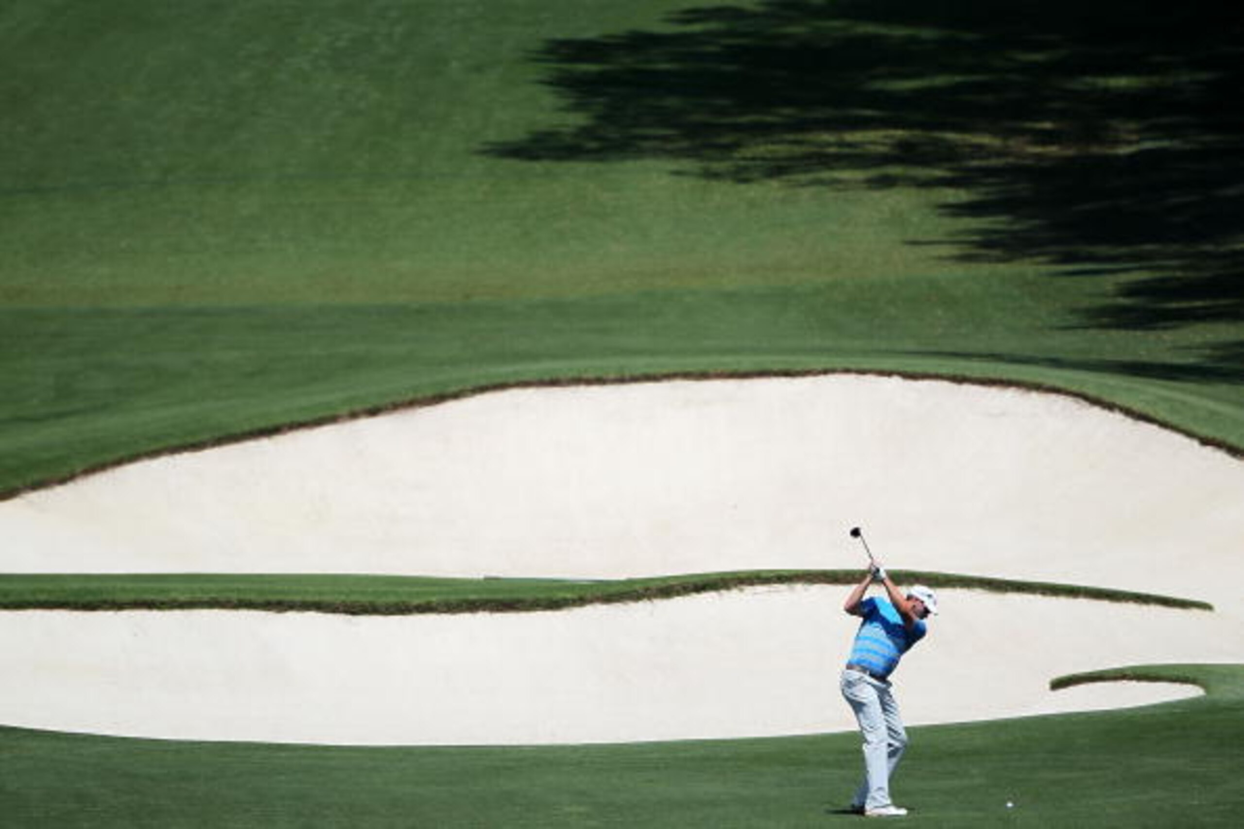 AUGUSTA, GA - APRIL 09:  Ricky Barnes plays his second shot on the eighth hole during the second round of the 2010 Masters Tournament at Augusta National Golf Club on April 9, 2010 in Augusta, Georgia.  (Photo by Jamie Squire/Getty Images)