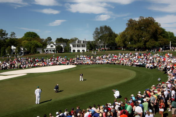 AUGUSTA, GA - APRIL 10:  Soren Kjeldsen of Denmark hits a putt on the ninth green as Fred Couples looks on during the third round of the 2010 Masters Tournament at Augusta National Golf Club on April 10, 2010 in Augusta, Georgia.  (Photo by Jamie Squire/G