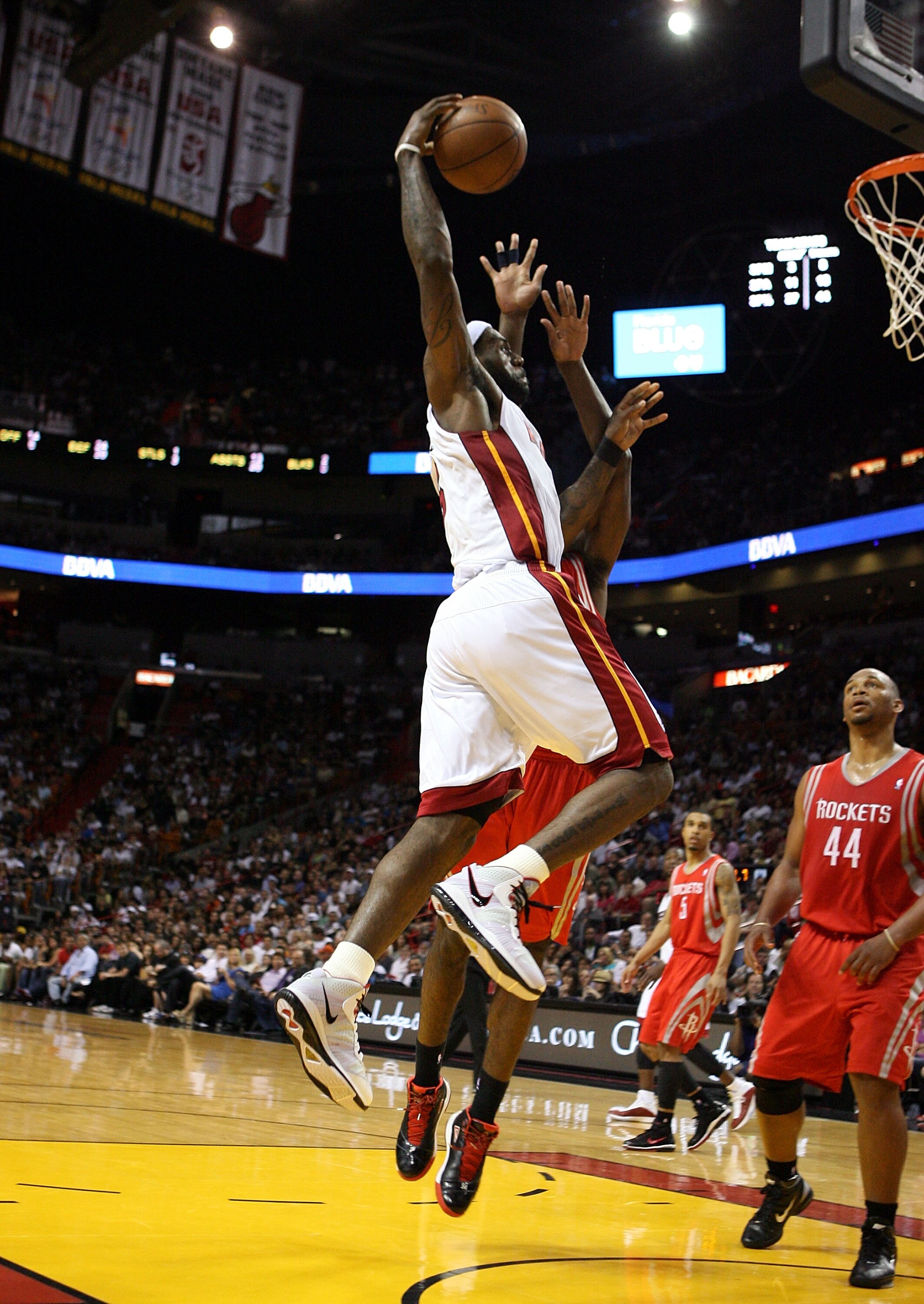 MIAMI, FL - MARCH 27:  Forward LeBron James #6 of the Miami Heat dunks against the Houston Rockets at American Airlines Arena on March 27, 2011 in Miami, Florida. The Heat defeated the Rockets 125-119. NOTE TO USER: User expressly acknowledges and agrees