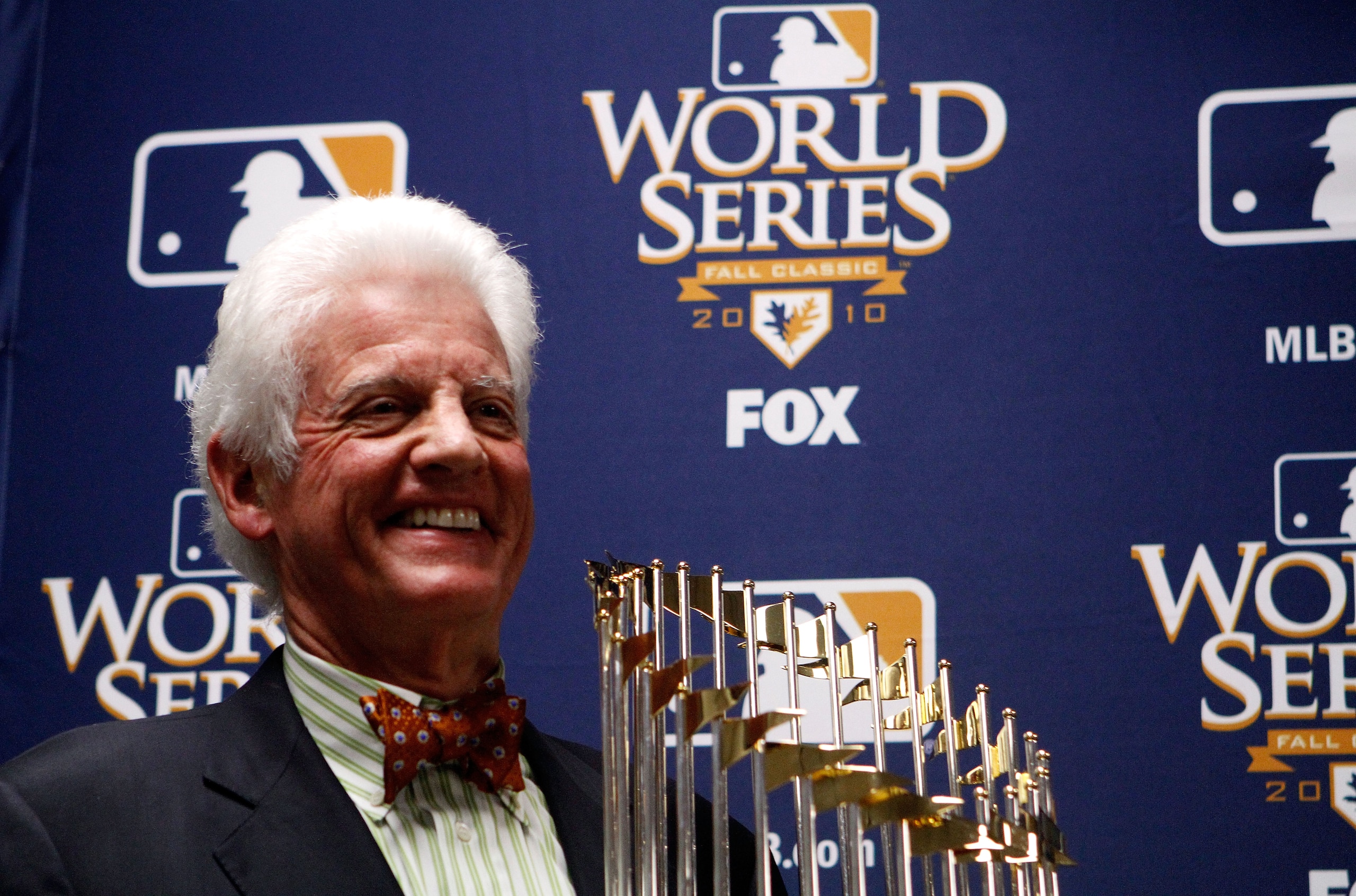 ARLINGTON, TX - NOVEMBER 01:  Owner of the San Francisco Giants, William H. Neukom, holds the World Series trophy after the Giants defeated the Texas Rangers 3-1 in Game Five of the 2010 MLB World Series at Rangers Ballpark in Arlington on November 1, 201