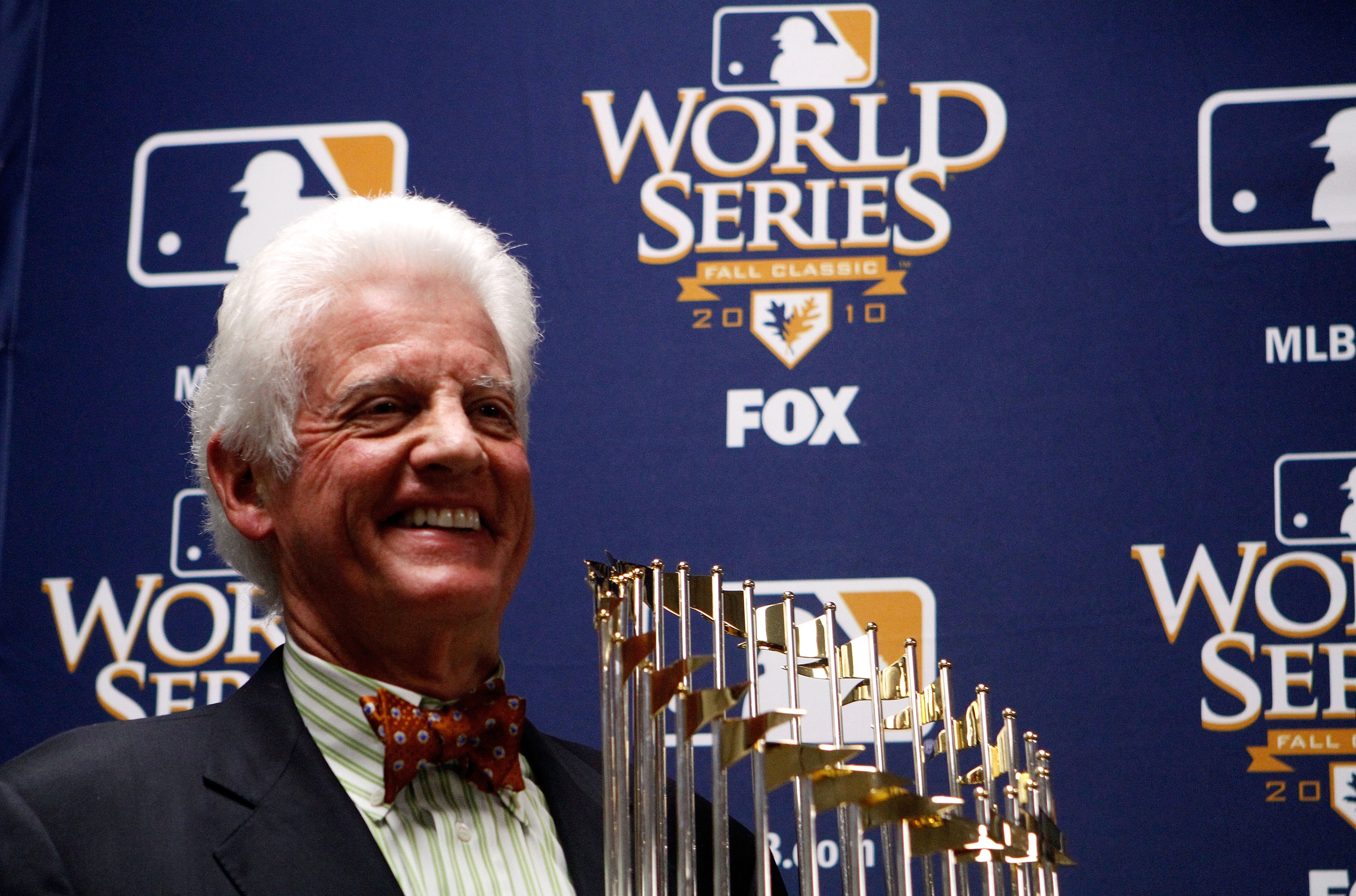 ARLINGTON, TX - NOVEMBER 01:  Owner of the San Francisco Giants, William H. Neukom, holds the World Series trophy after the Giants defeated the Texas Rangers 3-1 in Game Five of the 2010 MLB World Series at Rangers Ballpark in Arlington on November 1, 201