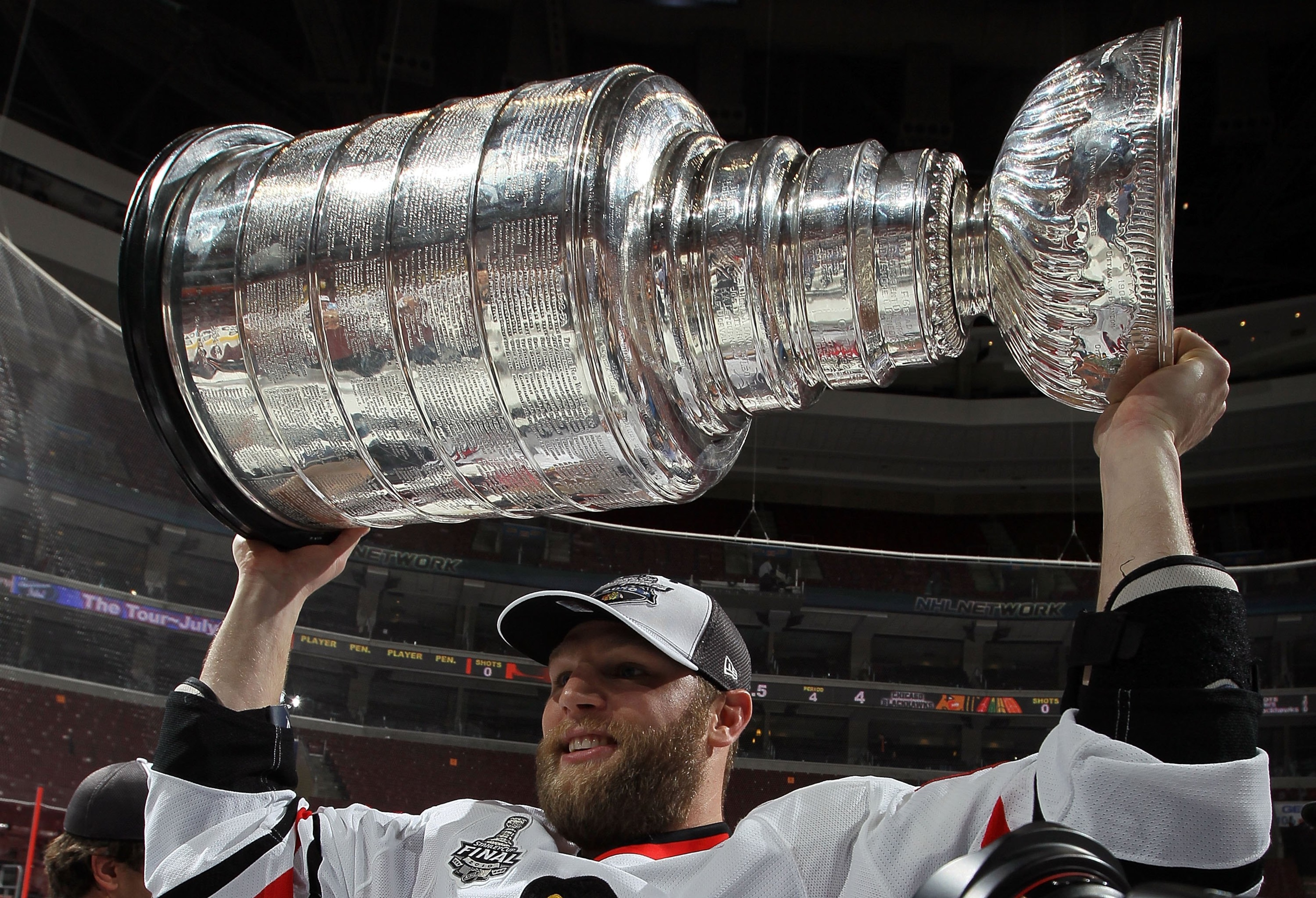 PHILADELPHIA - JUNE 09:  Ben Eager #55 of the Chicago Blackhawks hoists the Stanley Cup after teammate Patrick Kane scored the game-winning goal in overtime to defeat the Philadelphia Flyers 4-3 and win the Stanley Cup in Game Six of the 2010 NHL Stanley