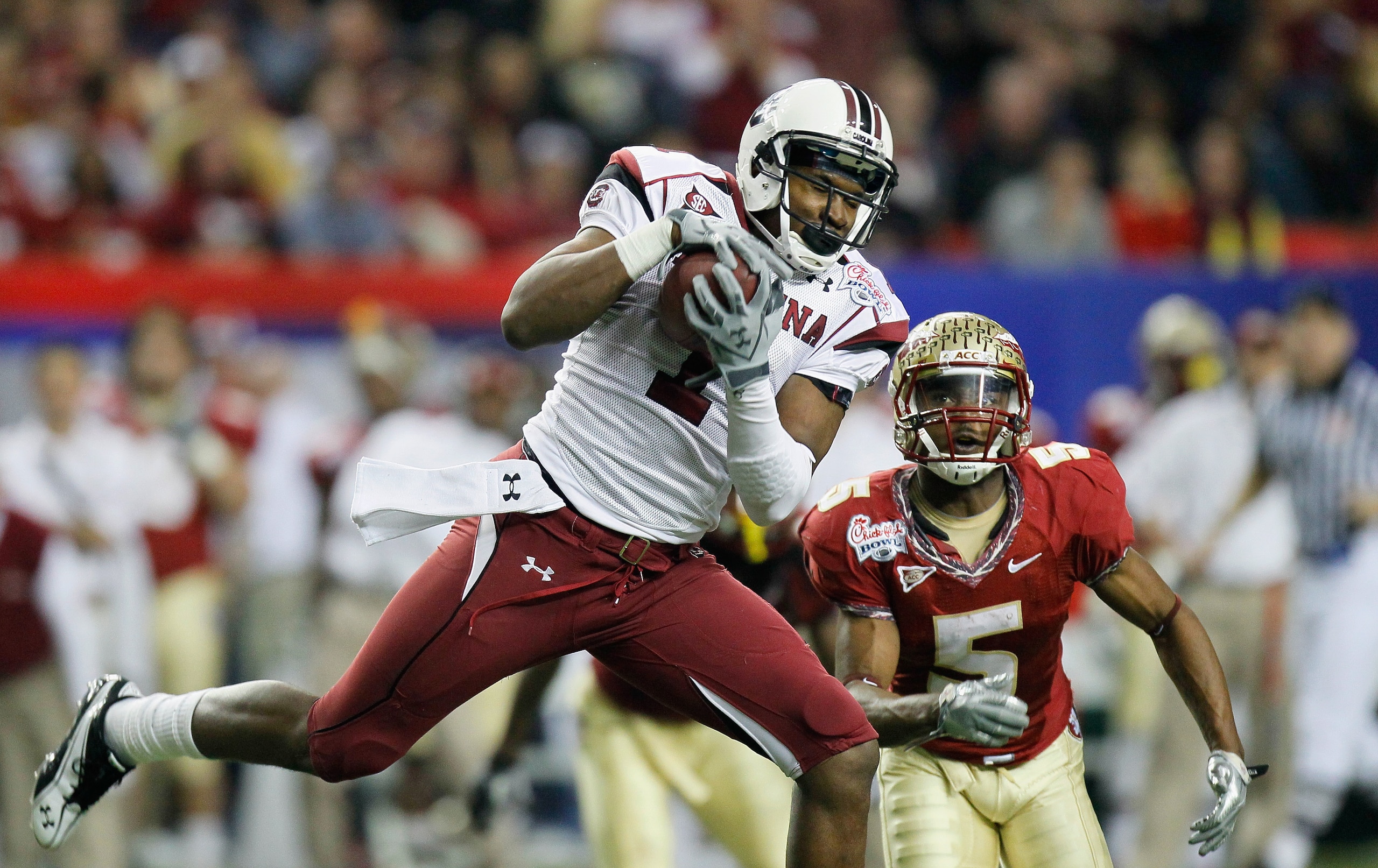 ATLANTA, GA - DECEMBER 31:  Alshon Jeffery #1 of the South Carolina Gamecocks pulls in this reception against Greg Reid #5 of the Florida State Seminoles during the 2010 Chick-fil-A Bowl at Georgia Dome on December 31, 2010 in Atlanta, Georgia.  (Photo by