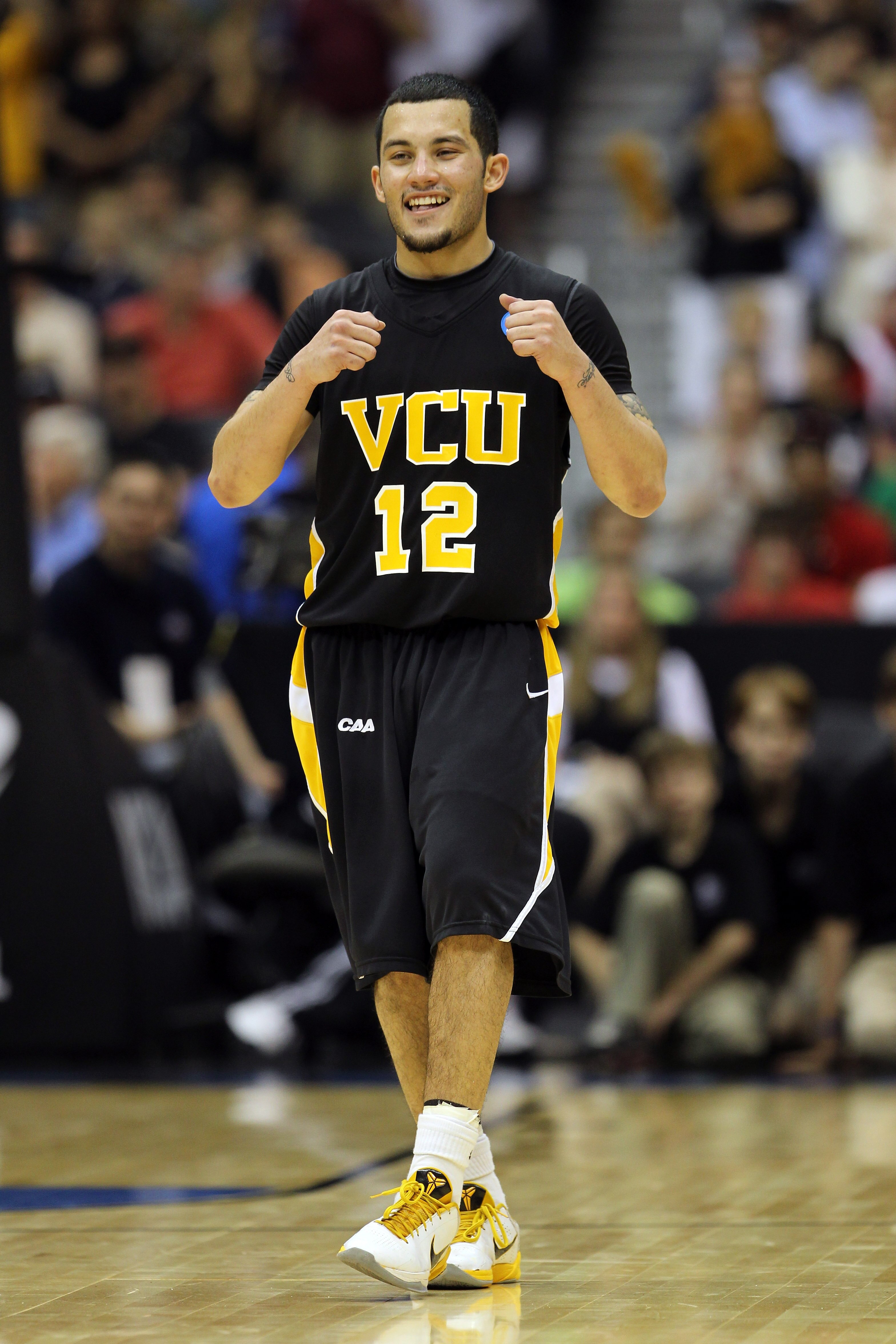 SAN ANTONIO, TX - MARCH 27:  Joey Rodriguez #12 of the Virginia Commonwealth Rams celebrates during the southwest regional final of the 2011 NCAA men's basketball tournament against the Kansas Jayhawks at the Alamodome on March 27, 2011 in San Antonio, Te