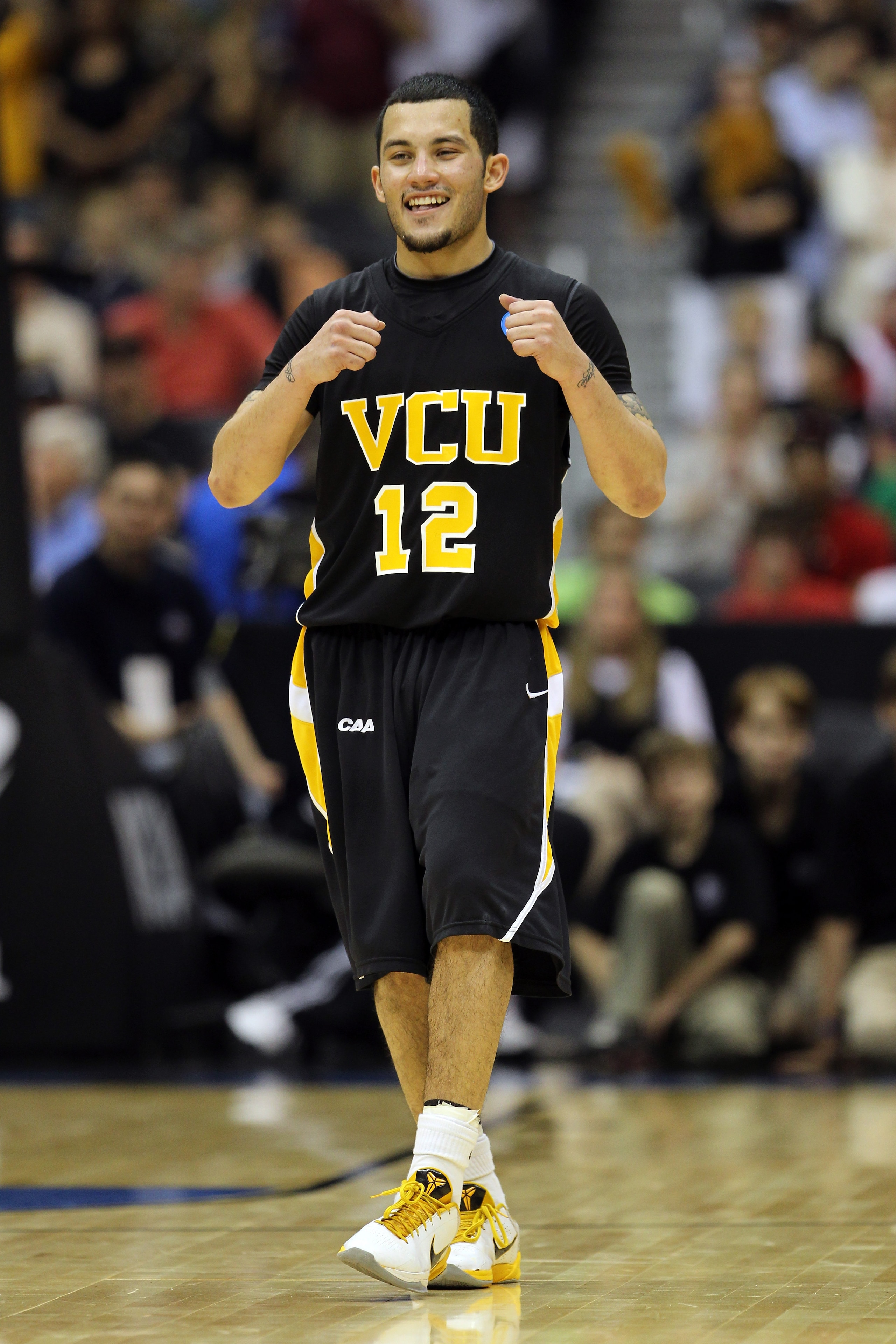 SAN ANTONIO, TX - MARCH 27:  Joey Rodriguez #12 of the Virginia Commonwealth Rams celebrates during the southwest regional final of the 2011 NCAA men's basketball tournament against the Kansas Jayhawks at the Alamodome on March 27, 2011 in San Antonio, Te