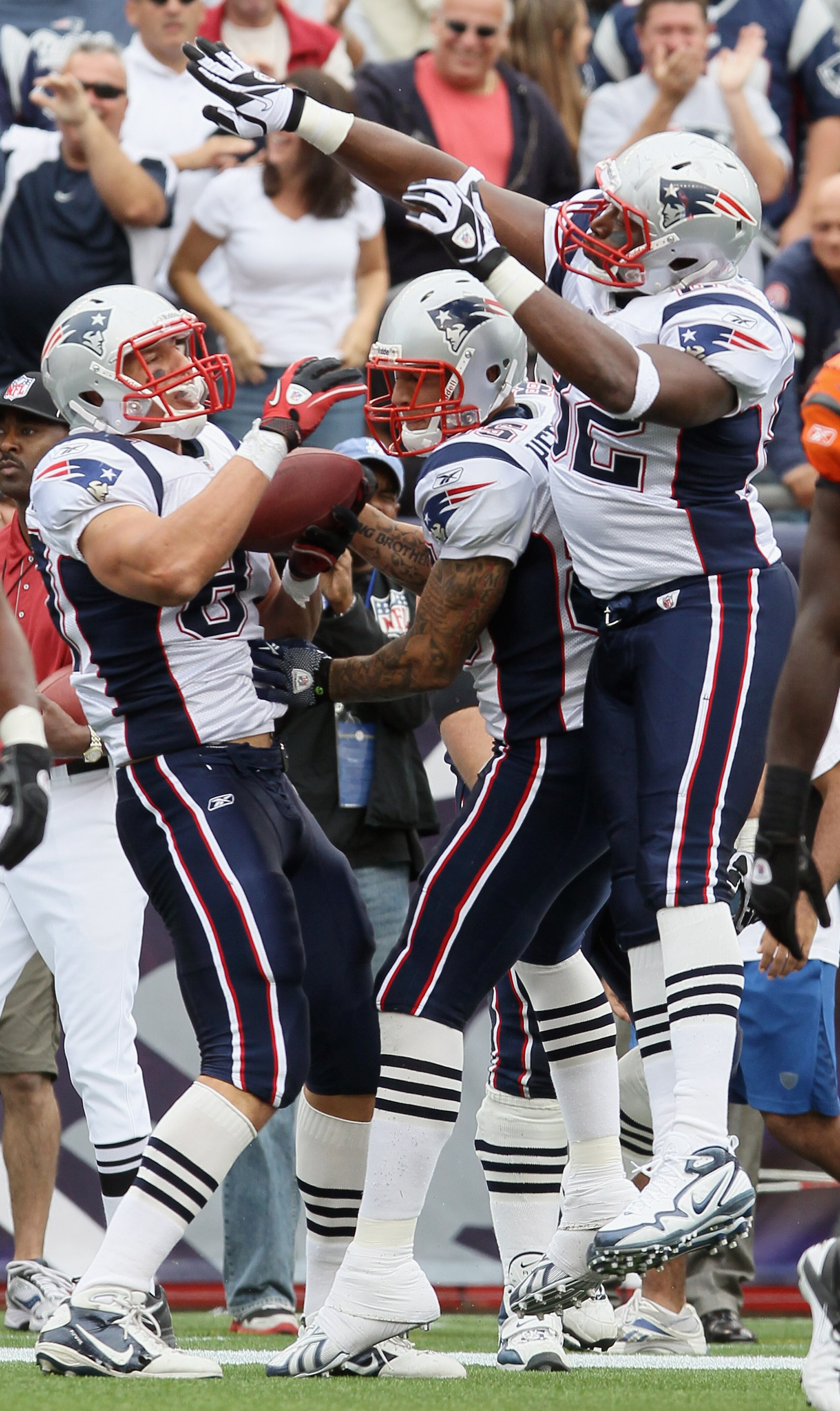 FOXBORO, MA - SEPTEMBER 12: Rob Gronkowski #87 of the New England Patriots celebrates his touchdown wit teammates Alge Crumpler #82 and Aaron Hernandez #85 in the fourth quarter against the Cincinnati Bengals during the NFL season opener on September 12, FOXBORO, MA - SEPTEMBER 12: Rob Gronkowski #87 of the New England Patriots celebrates his touchdown wit teammates Alge Crumpler #82 and Aaron Hernandez #85 in the fourth quarter against the Cincinnati Bengals during the NFL season opener on September 12,