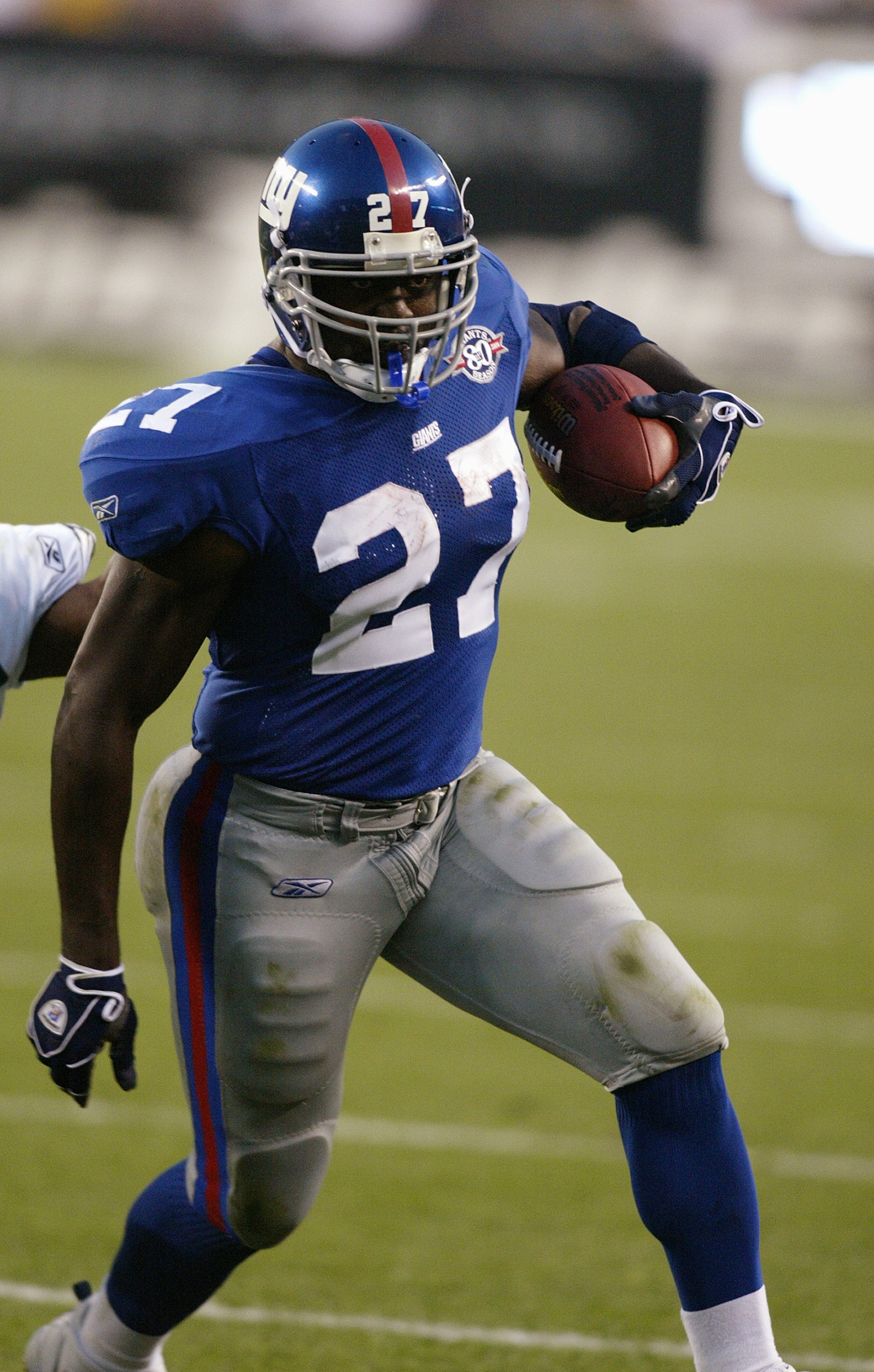 PHILADELPHIA - SEPTEMBER 12:  Ron Dayne of the New York Giants carries the ball against the Philadelphia Eagles on September 12, 2004 at Lincoln Financial Field in Philadelphia, Pennsylvania.  The Eagles won 31-17.  (Photo by Streeter Lecka/Getty Images)