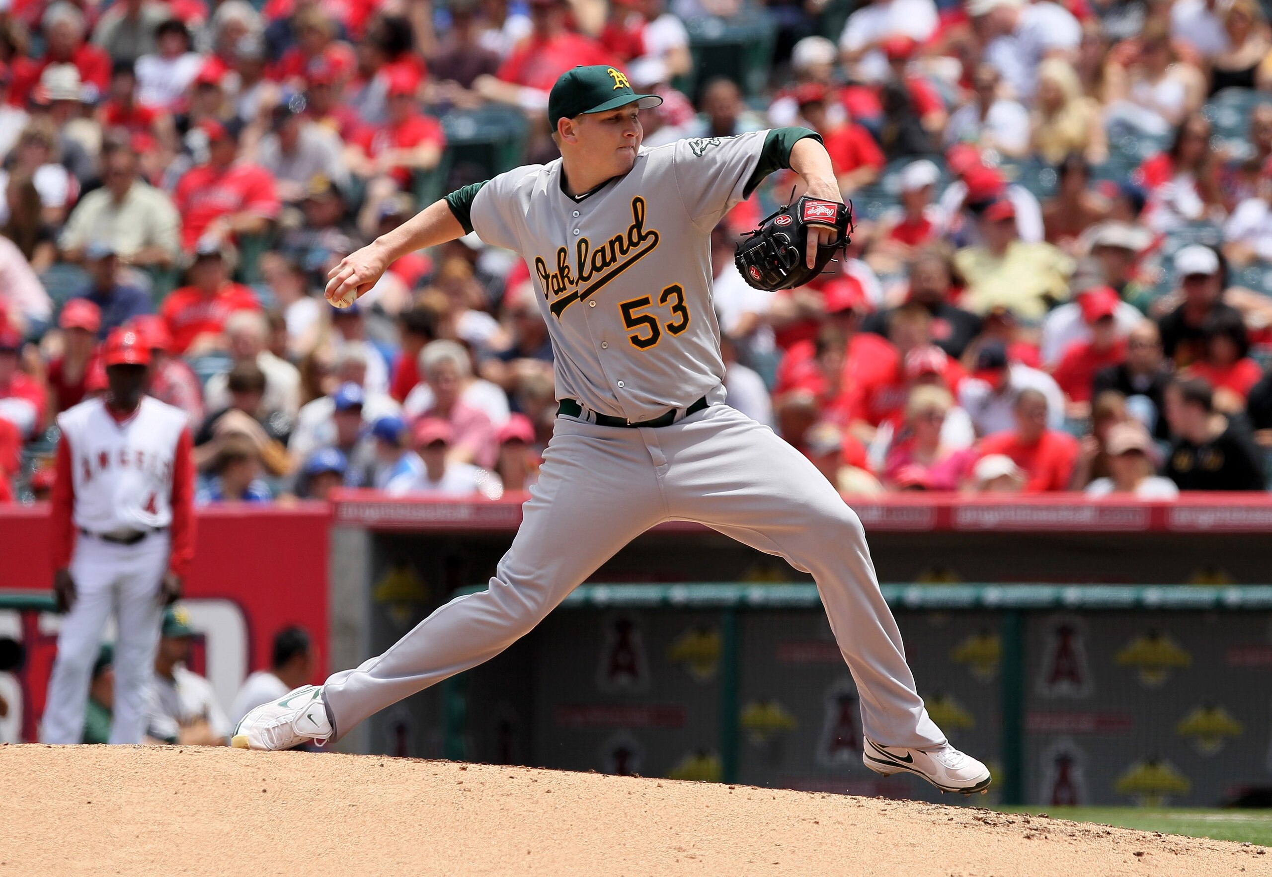 ANAHEIM, CA - MAY 16: Trevor Cahill #53 of the Oakland Athletics pitches against the Los Angeles Angels of Anaheim at Angel Stadium on May 16, 2010 in Anaheim, California. The Angels defeated the Athletics 4-0. (Photo by Jeff Gross/Getty Images) ANAHEIM, CA - MAY 16: Trevor Cahill #53 of the Oakland Athletics pitches against the Los Angeles Angels of Anaheim at Angel Stadium on May 16, 2010 in Anaheim, California. The Angels defeated the Athletics 4-0. (Photo by Jeff Gross/Getty Images)