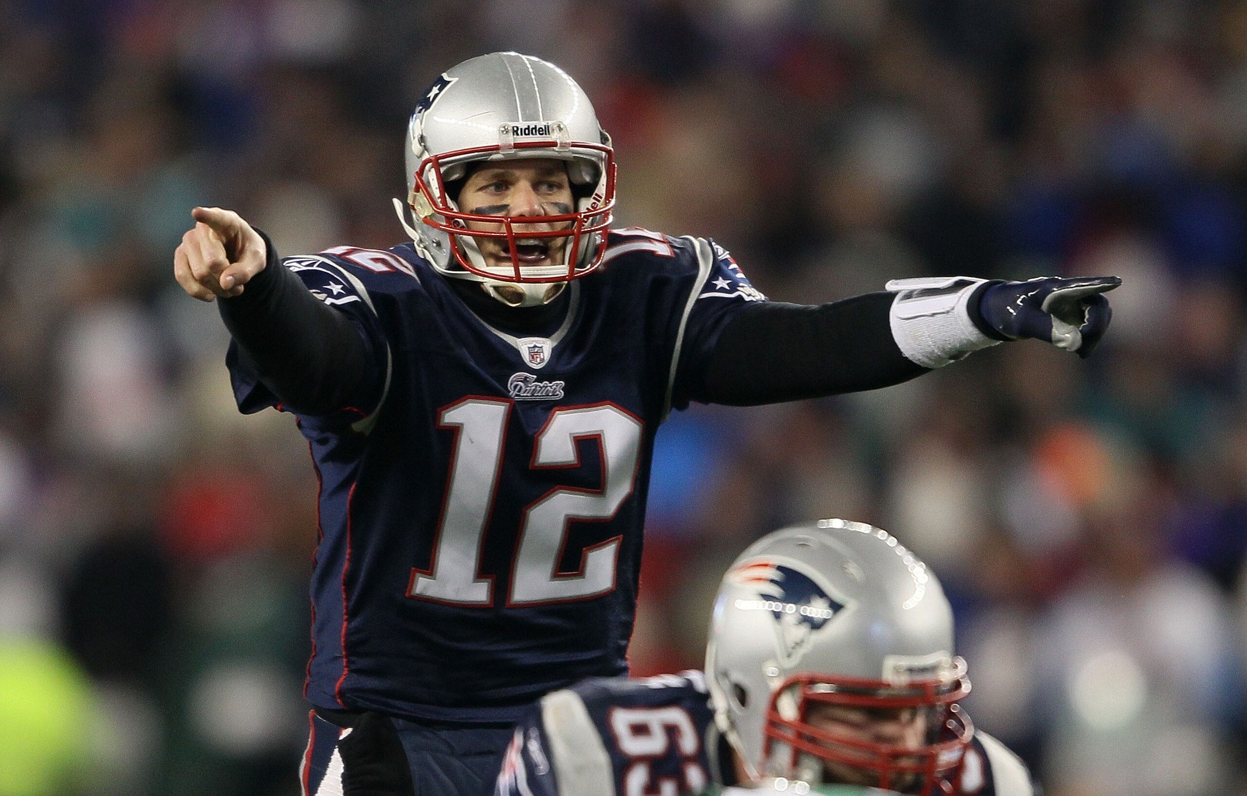 FOXBORO, MA - JANUARY 16: Quarterback Tom Brady #12 of the New England Patriots signals during their 2011 AFC divisional playoff game against the New York Jets at Gillette Stadium on January 16, 2011 in Foxboro, Massachusetts. (Photo by Elsa/Getty Image FOXBORO, MA - JANUARY 16: Quarterback Tom Brady #12 of the New England Patriots signals during their 2011 AFC divisional playoff game against the New York Jets at Gillette Stadium on January 16, 2011 in Foxboro, Massachusetts. (Photo by Elsa/Getty Image