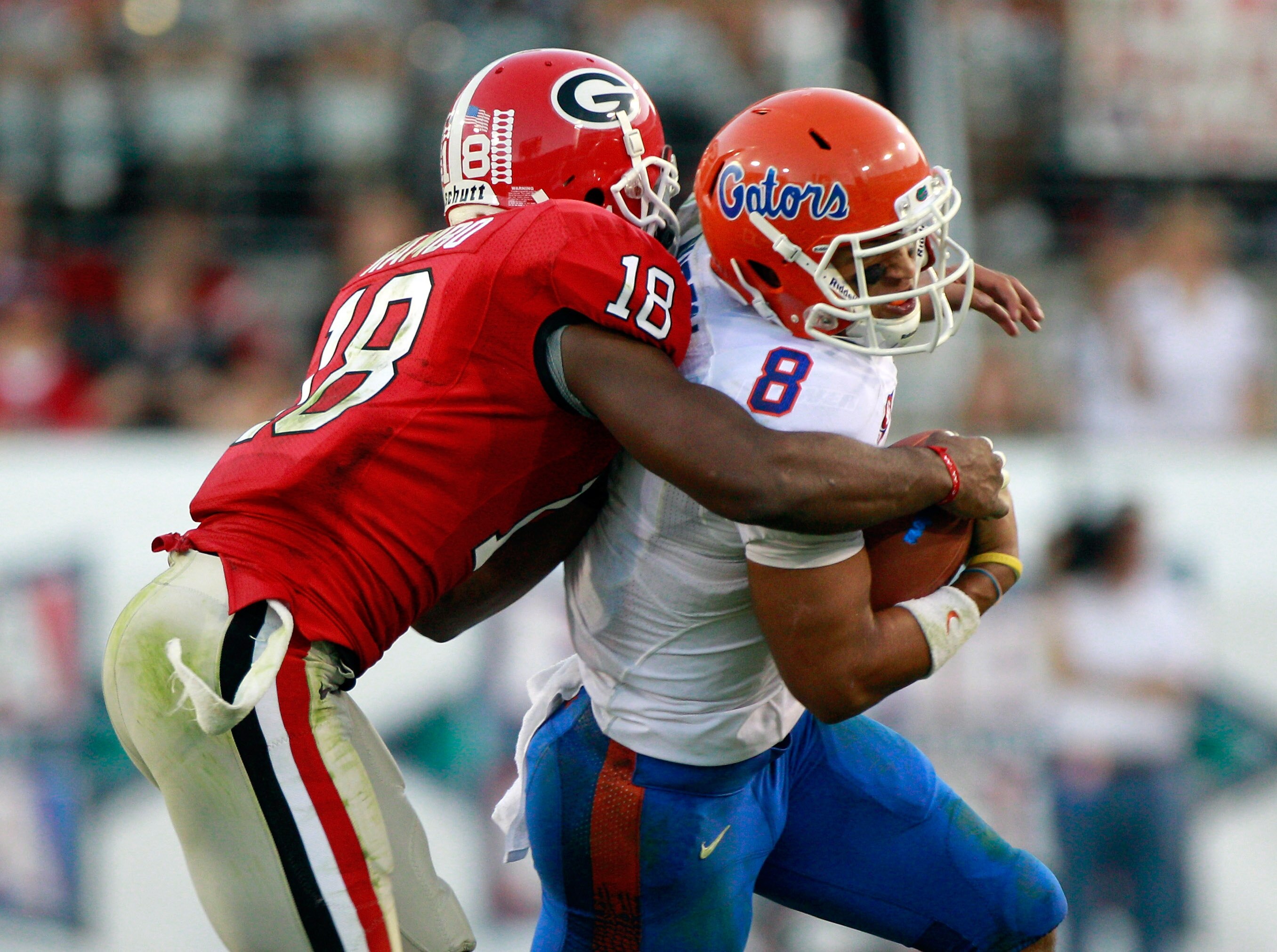 JACKSONVILLE, FL - OCTOBER 30:  Trey Burton #8 of the Florida Gators is tackled by Bacarri Rambo#18 of the Georgia Bulldogs during the game at EverBank Field on October 30, 2010 in Jacksonville, Florida.  (Photo by Sam Greenwood/Getty Images)