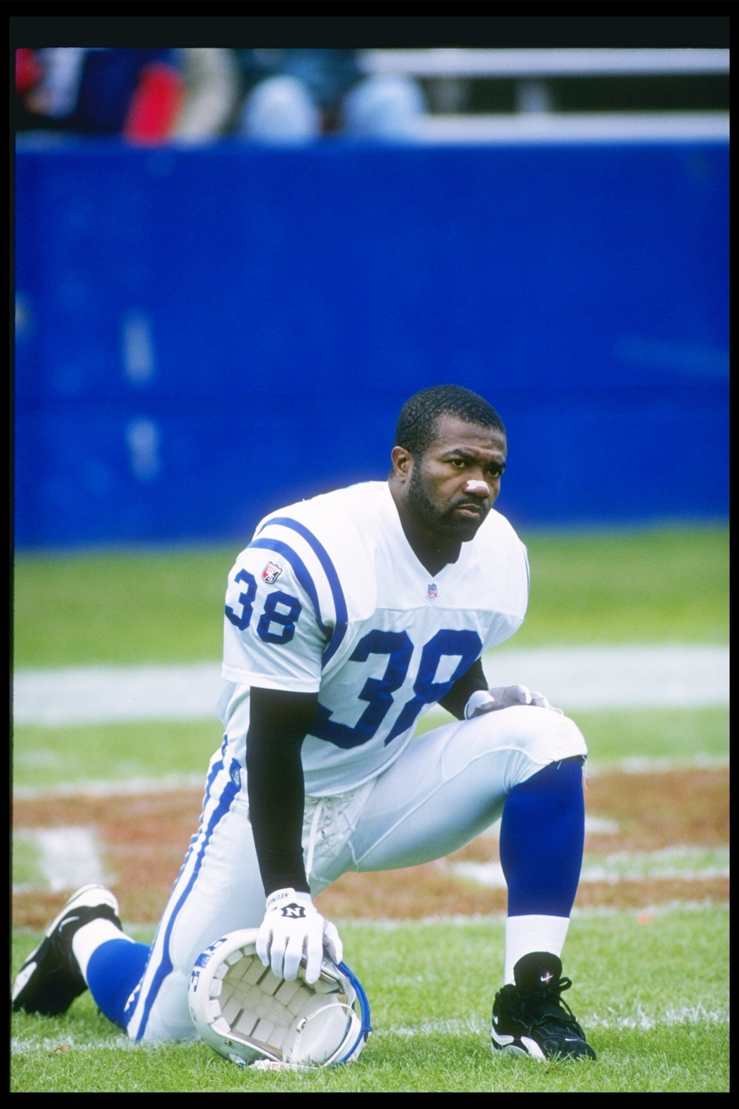 19 Nov 1995:  Defensive back Eugene Daniel of the Indianapolis Colts takes a knee during a game against the New England Patriots at Foxboro Stadium in Foxboro, Massachusetts.  The Patriots won the game 24-10. Mandatory Credit: Rick Stewart  /Allsport