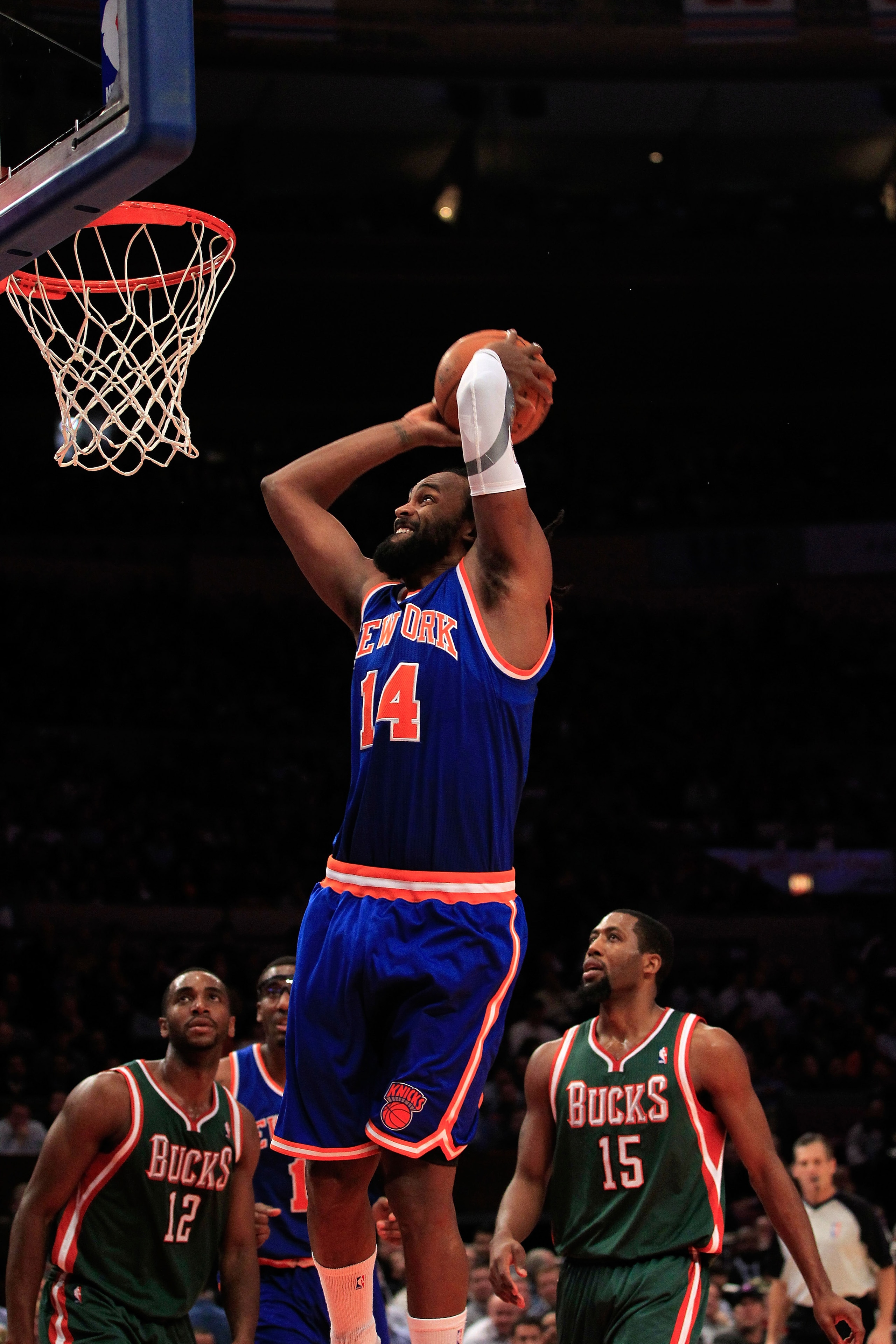 NEW YORK, NY - FEBRUARY 23:  Ronny Turiaf #14 of the New York Knicks dunks the ball against the Milwaukee Bucks at Madison Square Garden on February 23, 2011 in New York City. NOTE TO USER: User expressly acknowledges and agrees that, by downloading and/o