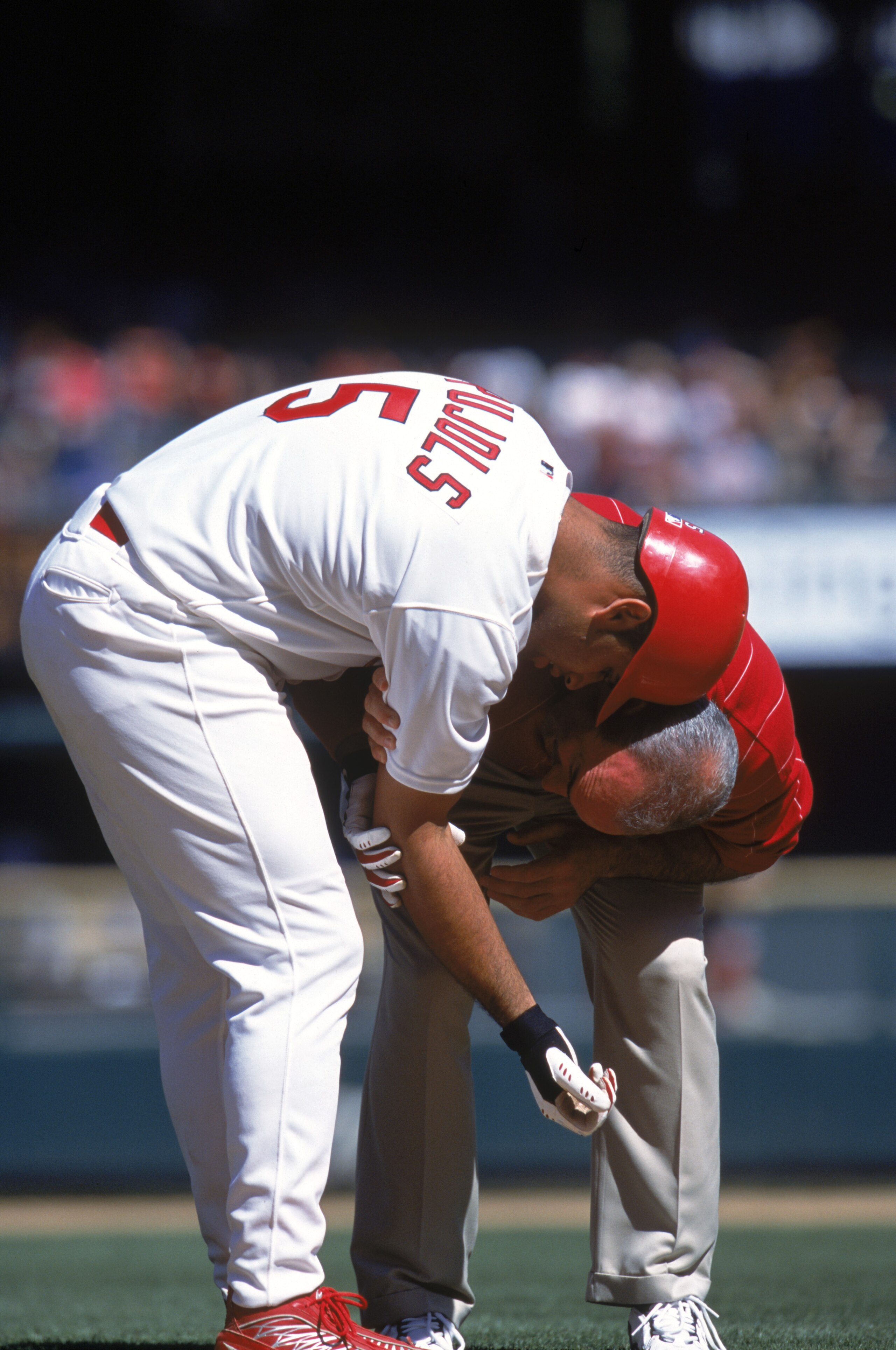 ST. LOUIS - APRIL 26:  Albert Pujols #5 of the St. Louis Cardinals is injured during the game against the Montreal Expos at Busch Stadium on April 26, 2001 in St. Louis, Missouri. The Montreal Expos defeated the Cardinals 4-3. (Photo by: Elsa/Getty Images