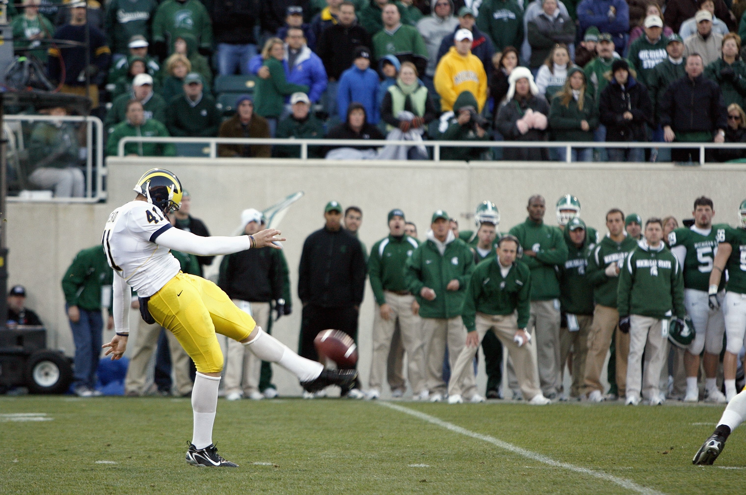 EAST LANSING, MI - NOVEMBER 3: Zoltan Mesko #41 of the Michigan Wolverines punts the ball during the game against the Michigan State Spartans at Spartan Stadium November 3, 2007 in East Lansing, Michigan.  Michigan defeated Michigan State 28-24. (Photo by