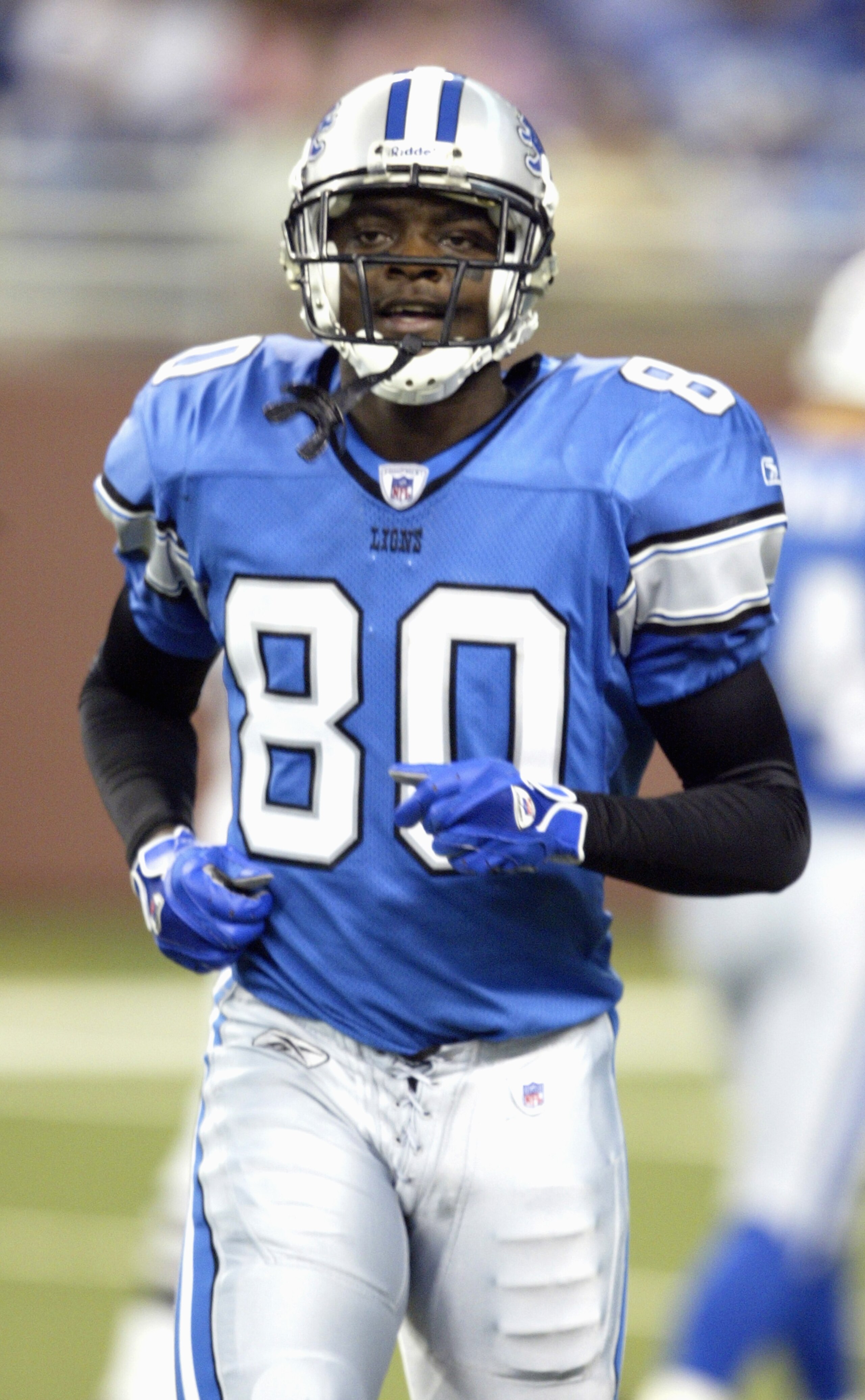 DETROIT- AUGUST 20:  Wide receiver Charles Rogers #80 of the Detroit Lions moves into position during the preseason game against the Cleveland Browns  on August 20, 2005 at Ford Field in Detroit, Michigan. The Browns won 21-13. (photo by Tom Pidgeon/Getty