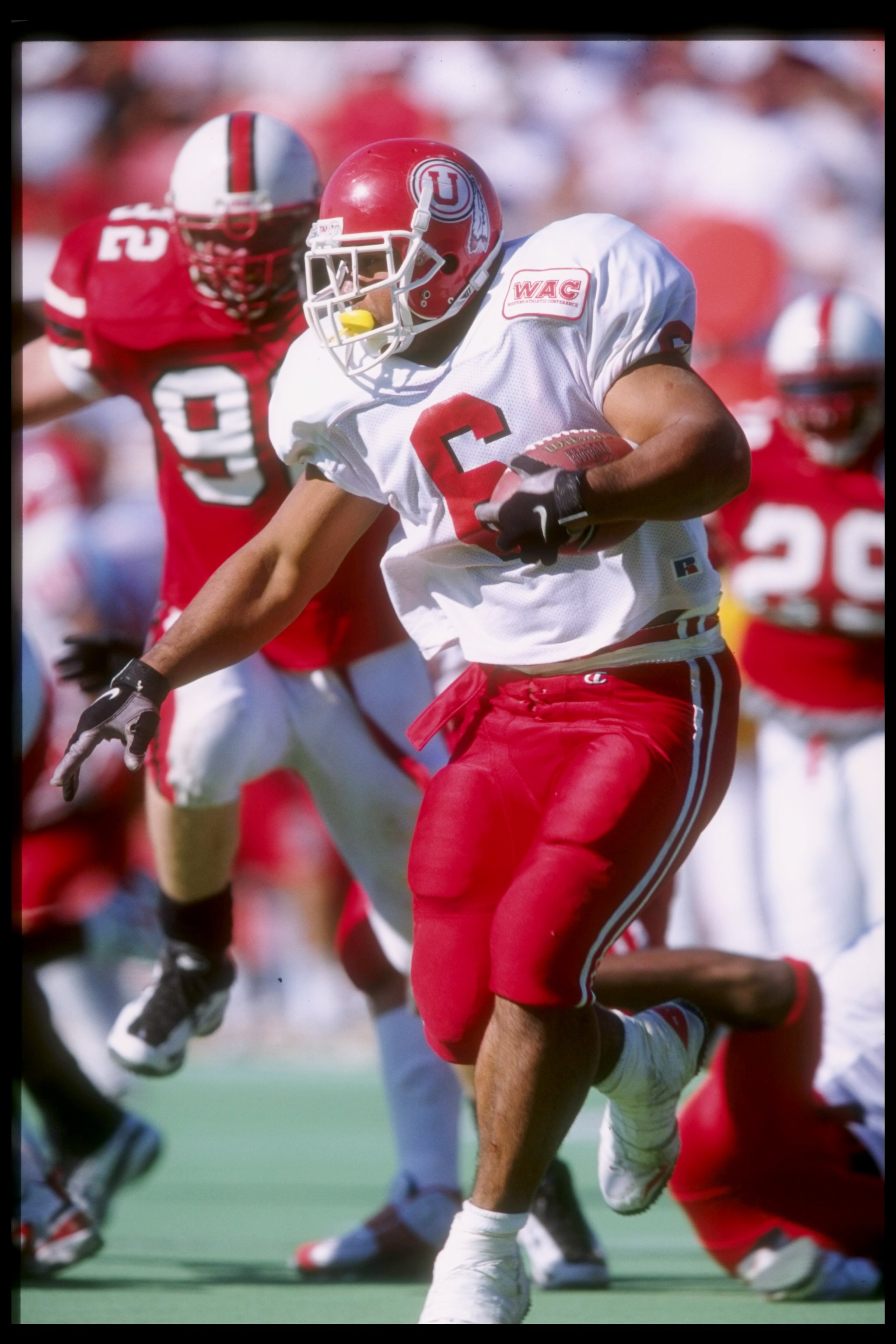 6 Sep 1997:  Chris Fuamatu-Ma''afala #6 carries the football during the Utes 27-21 win over Louisville University at Commonwealth Stadium in Lexington, Kentucky. Mandatory Credit: Andy Lyons  /Allsport