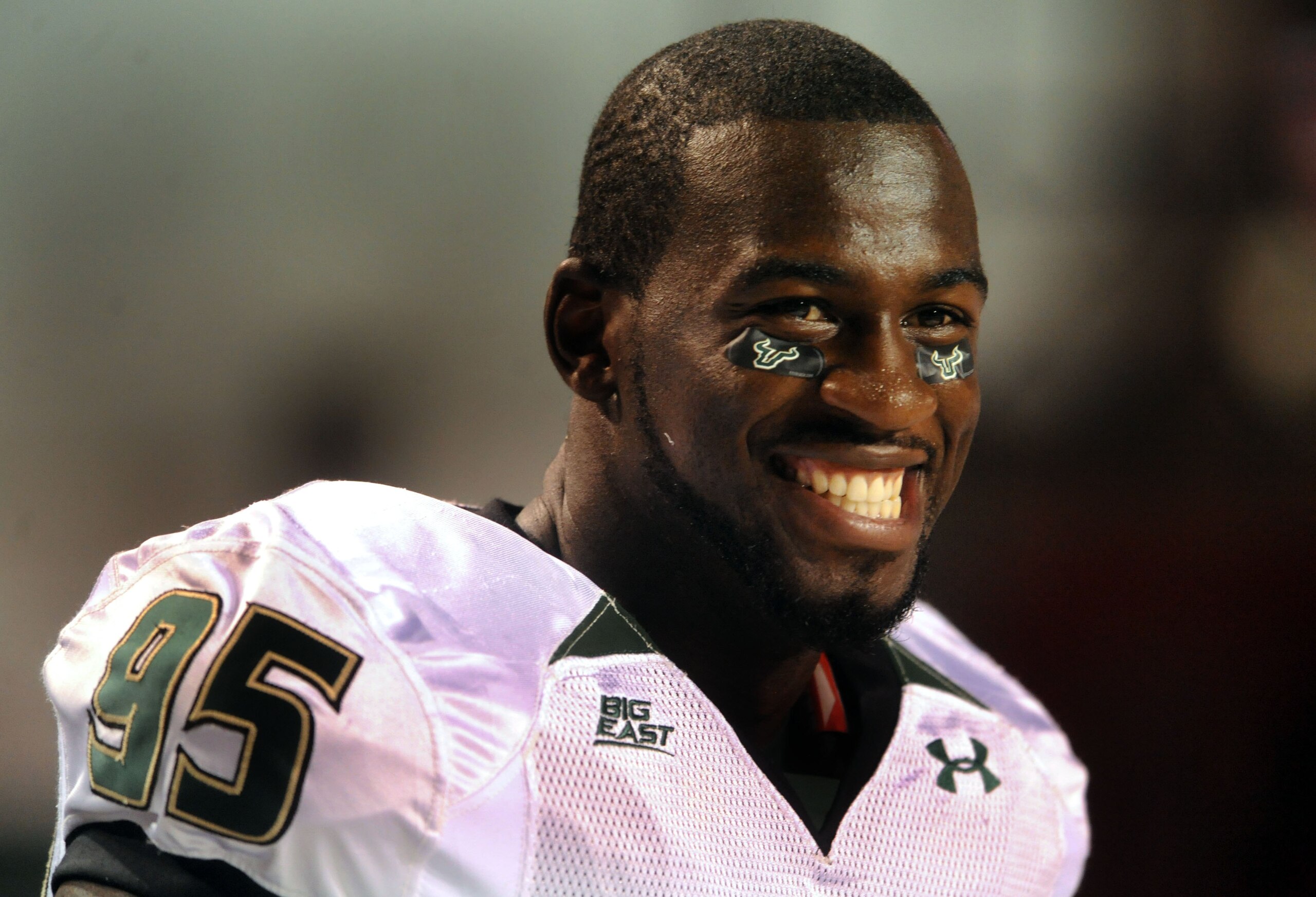 RALEIGH, NC - SEPTEMBER 27: Defensive end George Selvie #95 of South Florida Bulls looks out at the action on the field from the bench in the third quarter of the college football game against North Carolina State Wolfpack at Carter-Finley Stadium on Sep RALEIGH, NC - SEPTEMBER 27: Defensive end George Selvie #95 of South Florida Bulls looks out at the action on the field from the bench in the third quarter of the college football game against North Carolina State Wolfpack at Carter-Finley Stadium on Sep
