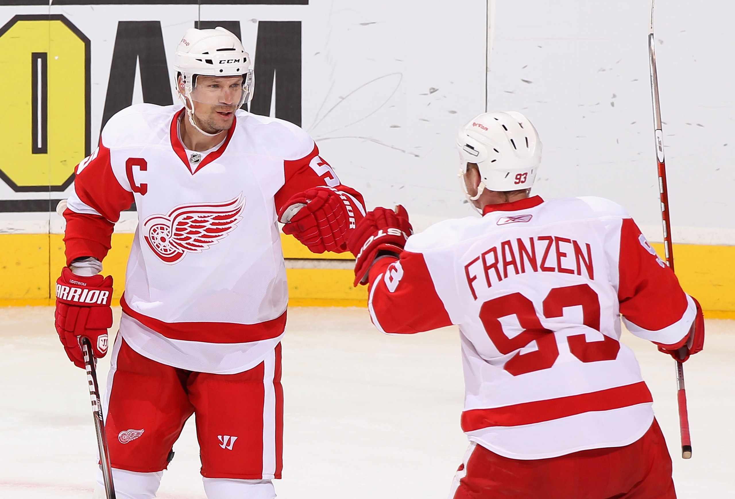 GLENDALE, AZ - MARCH 05:  Nicklas Lidstrom #5 and Johan Franzen #93 of the Detroit Red Wings celebrate after Franzen scored a first period power play goal against the Phoenix Coyotes during the NHL game at Jobing.com Arena on March 5, 2011 in Glendale, Ar