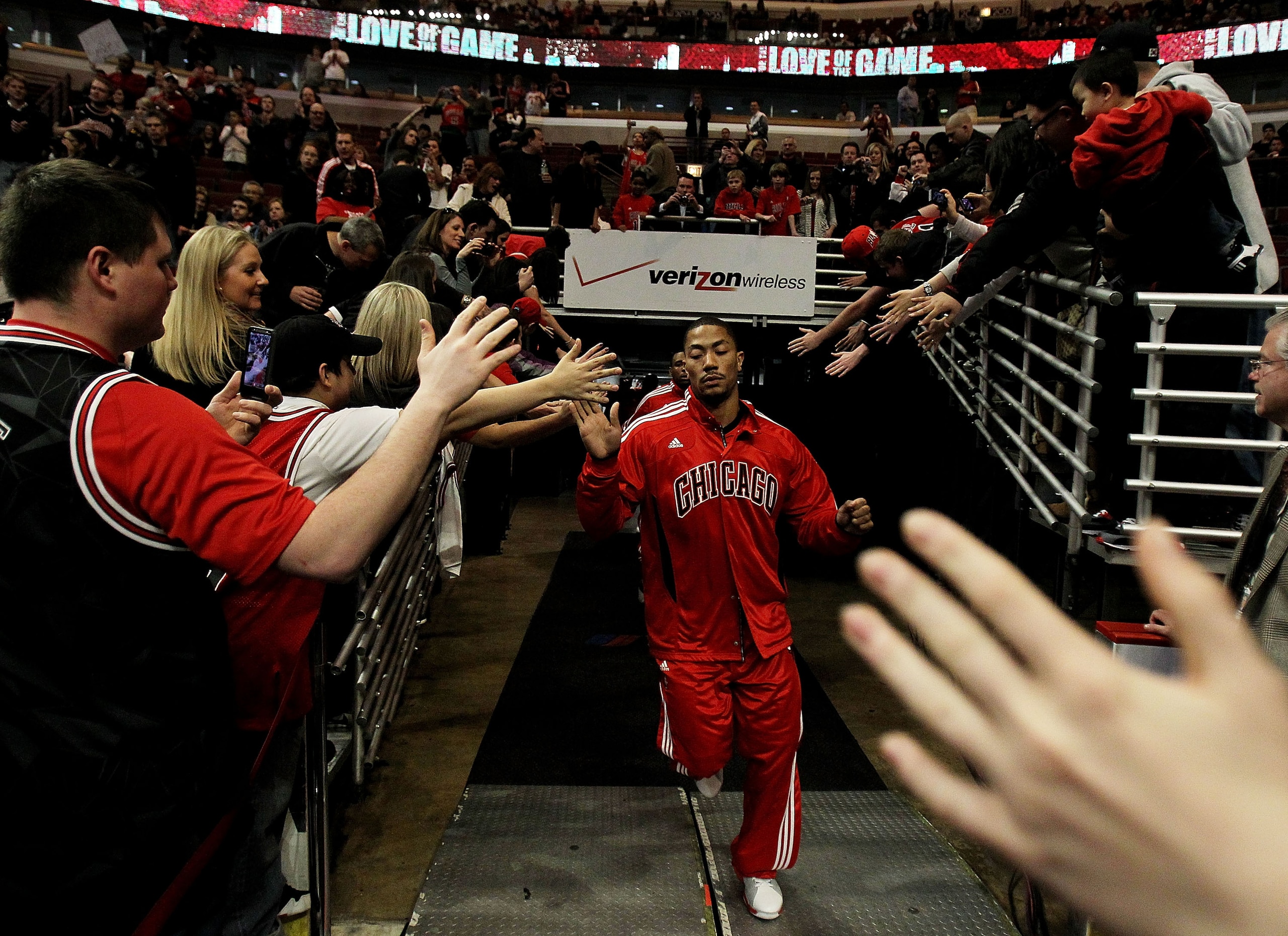 CHICAGO, IL - MARCH 25: Derrick Rose #1 of the Chicago Bulls runs to the court before a game against the Memphis Girzzlies at the United Center on March 25, 2011 in Chicago, Illinois. Rose will donate $1,000.00 for every point he scored tonight to the Dir