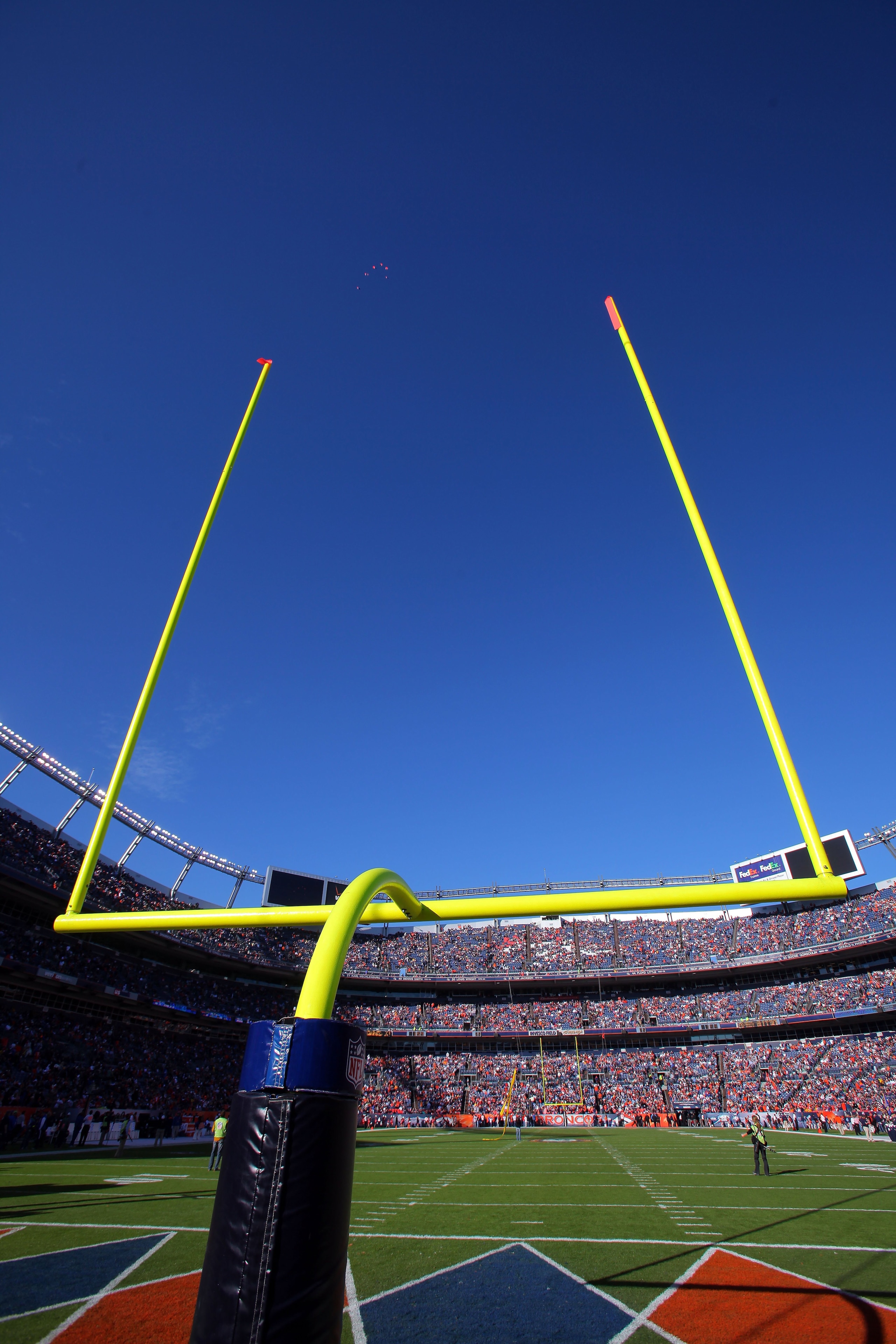 DENVER - NOVEMBER 22: A general view of the goal post against the blue sky as the Denver Broncos host the San Diego Chargers during NFL action at Invesco Field at Mile High on November 22, 2009 in Denver, Colorado. The Chargers defeated the Broncos 32-3. DENVER - NOVEMBER 22: A general view of the goal post against the blue sky as the Denver Broncos host the San Diego Chargers during NFL action at Invesco Field at Mile High on November 22, 2009 in Denver, Colorado. The Chargers defeated the Broncos 32-3.