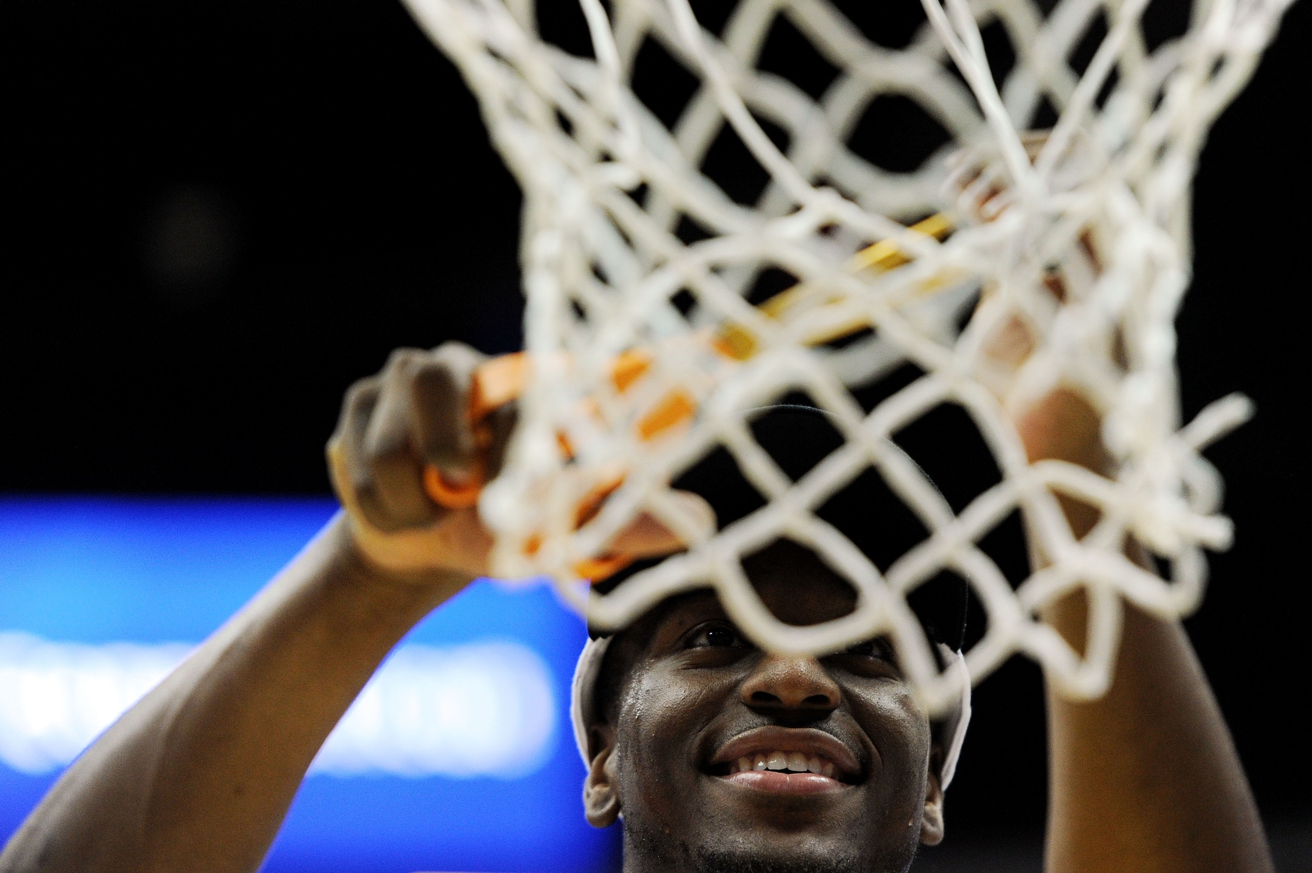 ANAHEIM, CA - MARCH 26:  Kemba Walker #15 of the Connecticut Huskies cuts down the net after defeating the Arizona Wildcats during the west regional final of the 2011 NCAA men's basketball tournament at the Honda Center on March 26, 2011 in Anaheim, Calif