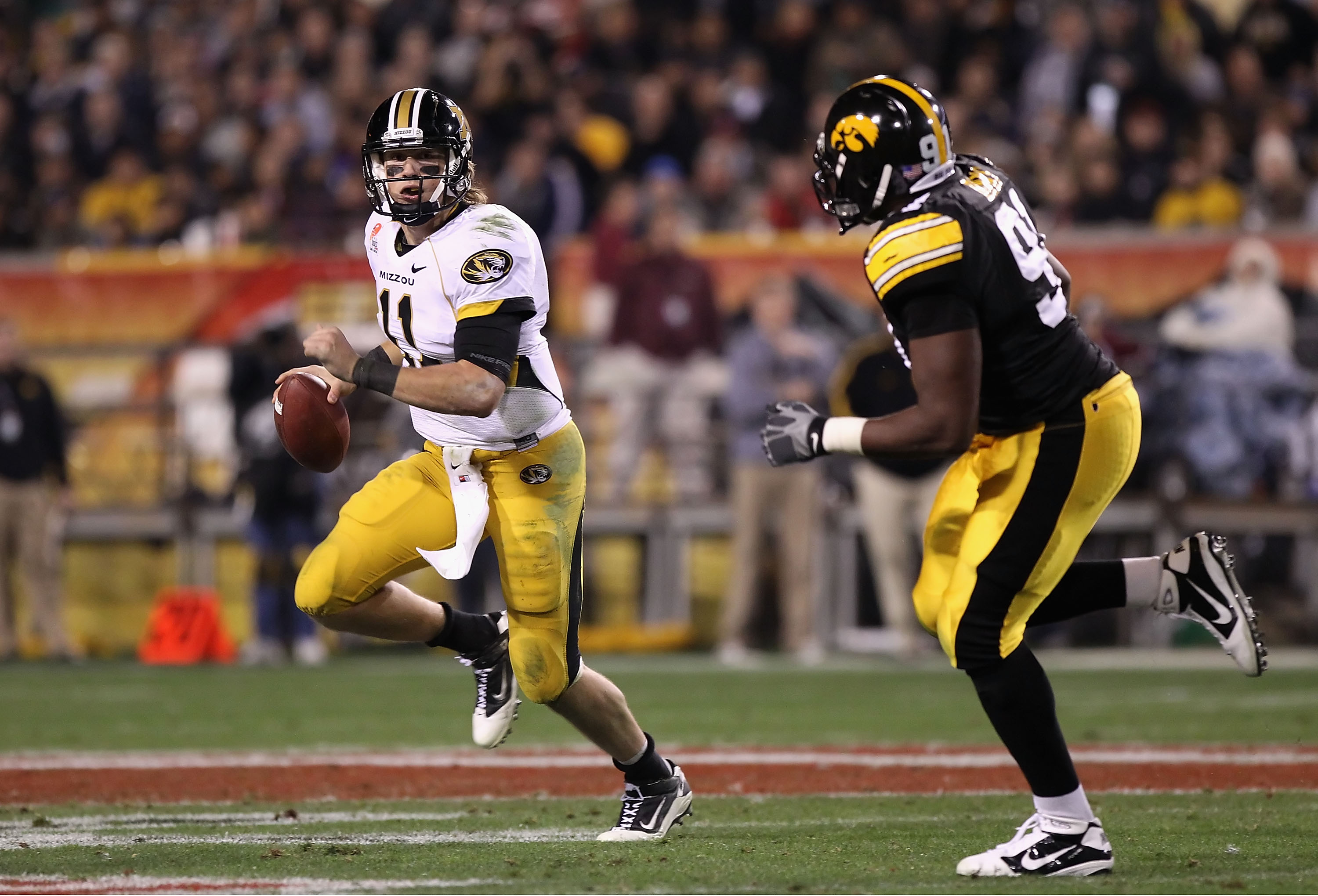 TEMPE, AZ - DECEMBER 28:  Quarterback Blaine Gabbert #11 of the Missouri Tigers drops back to pass during the Insight Bowl against the Iowa Hawkeyes  at Sun Devil Stadium on December 28, 2010 in Tempe, Arizona.  The Hawkeyes defeated the Tigers 27-24.  (P