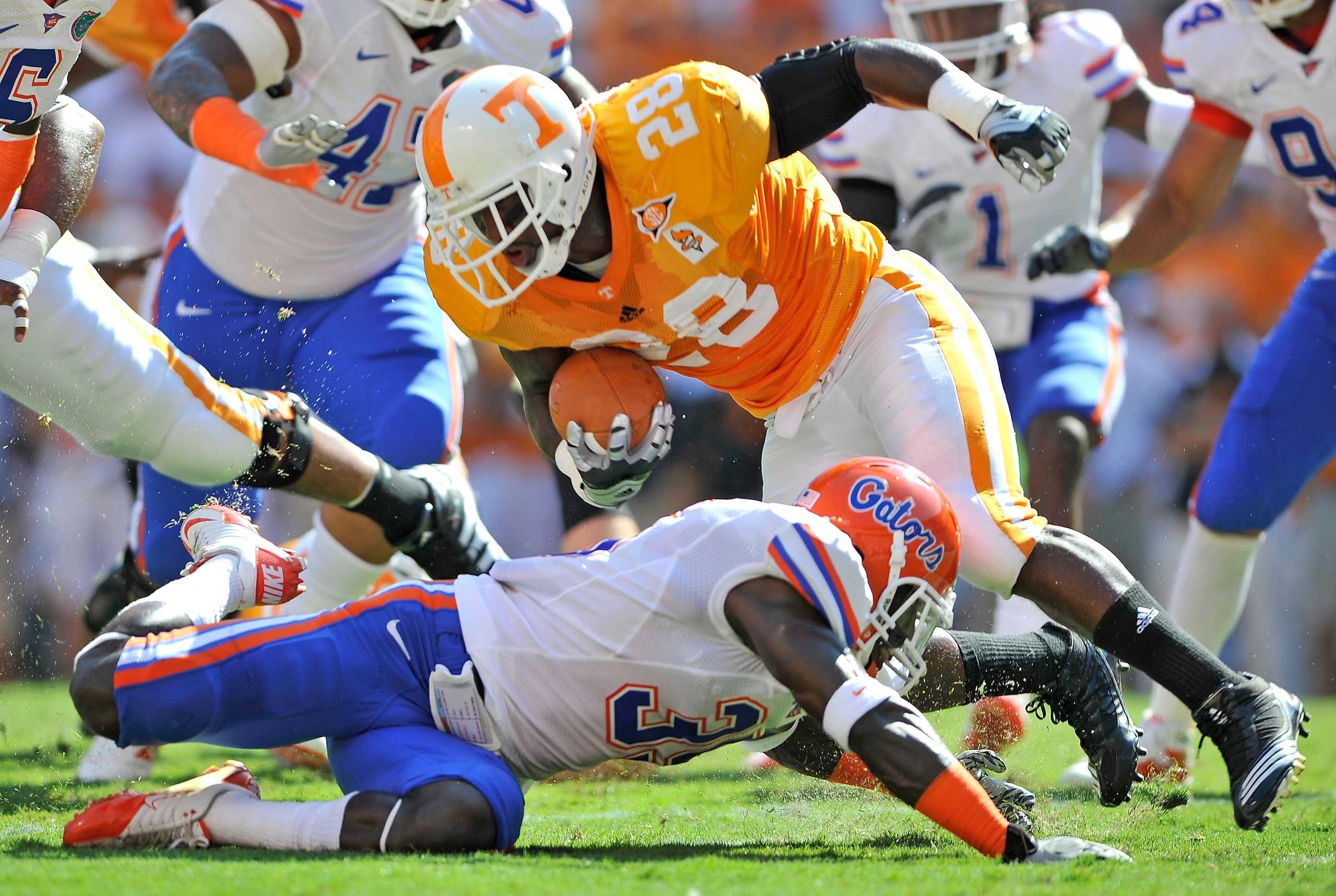 KNOXVILLE, TN - SEPTEMBER 18:  Ahmad Black #35 of the Florida Gators tackles Tauren Poole #28 of the Tennessee Volunteers in the backfield during the first half at Neyland Stadium on September 18, 2010 in Knoxville, Tennessee.  (Photo by Grant Halverson/G