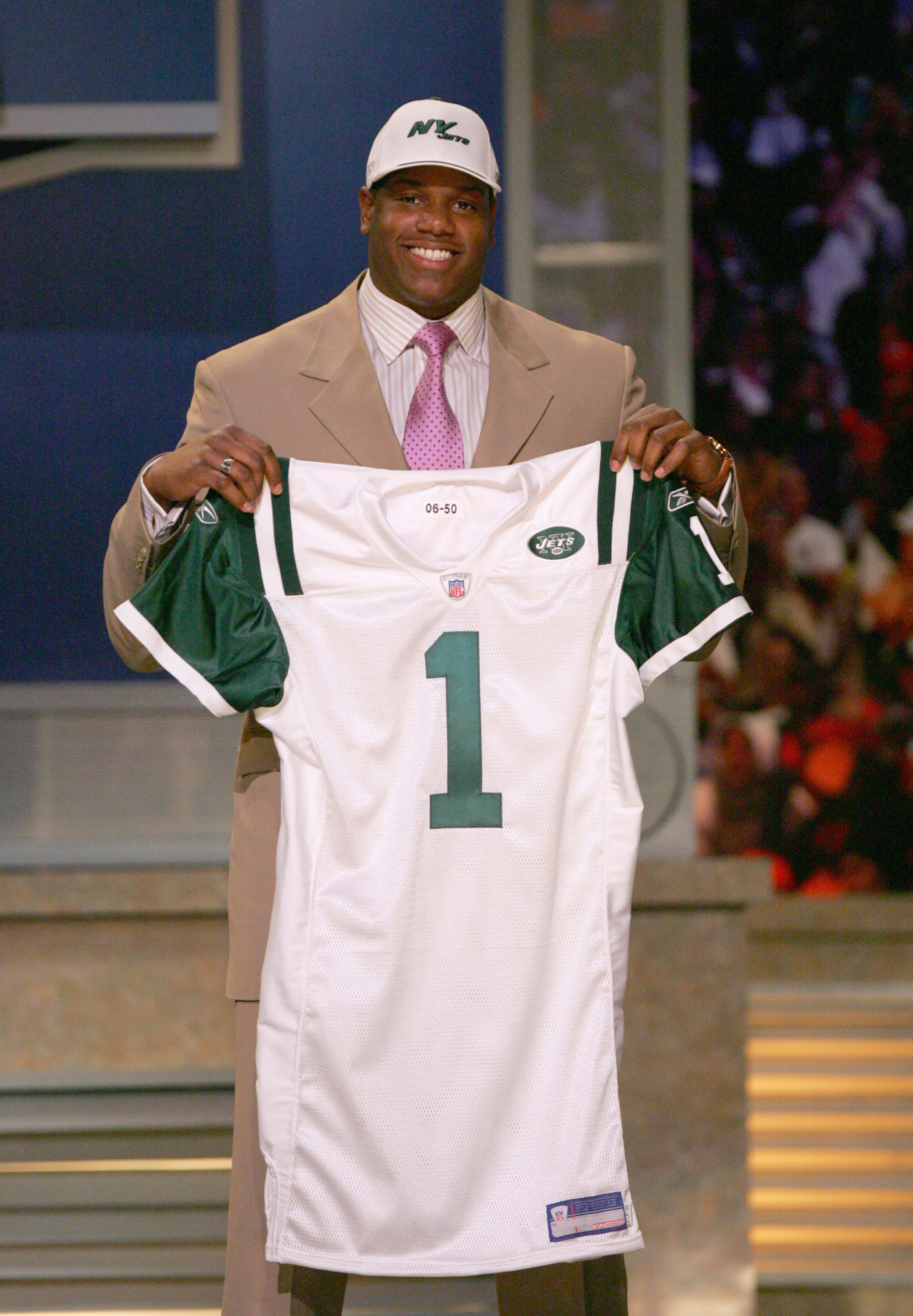 NEW YORK - APRIL 29: D'Brickashaw Ferguson poses with with his new jersey after being selected fourth overall by the New York Jets in the 2006 NFL Draft at Radio City Music Hall on April 29, 2006 in New York City. (Photo by Ezra Shaw/Getty Images)