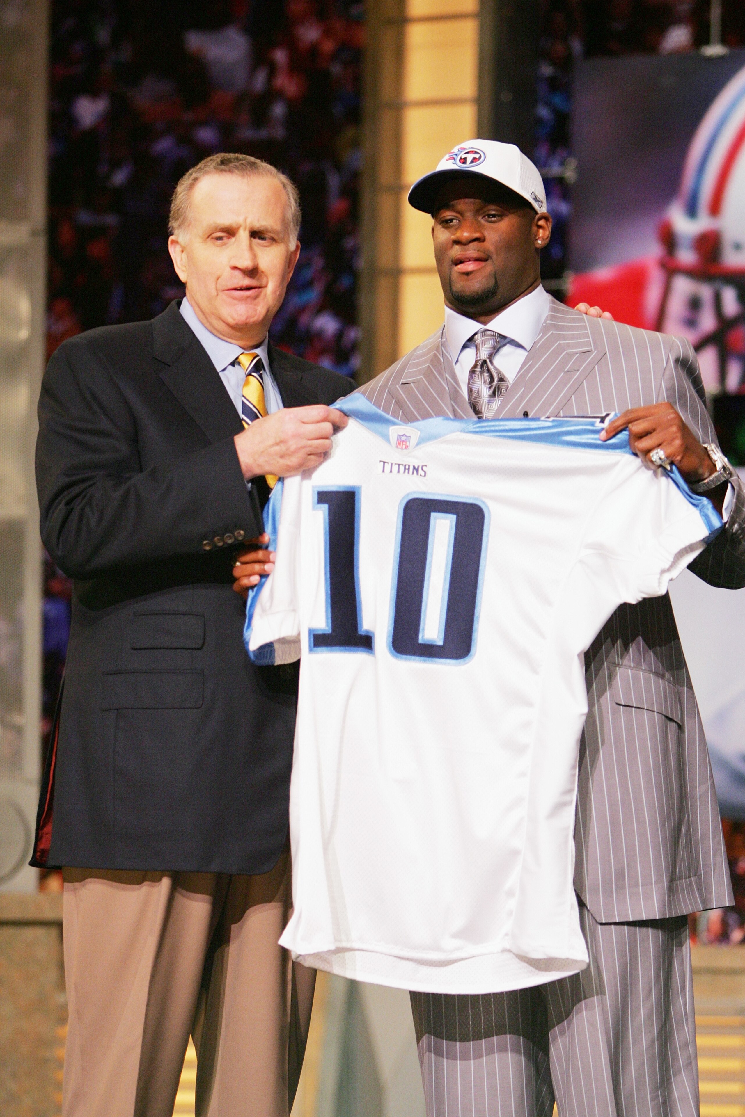 NEW YORK - APRIL 29:  Commissioner Paul Tagliabue and Vince Young pose for a photo after Young was drafted by the Tennessee Titans during the 2006 NFL Draft on April 29, 2006 at Radio City Music Hall in New York, New York. (Photo by Chris Trotman/Getty Im