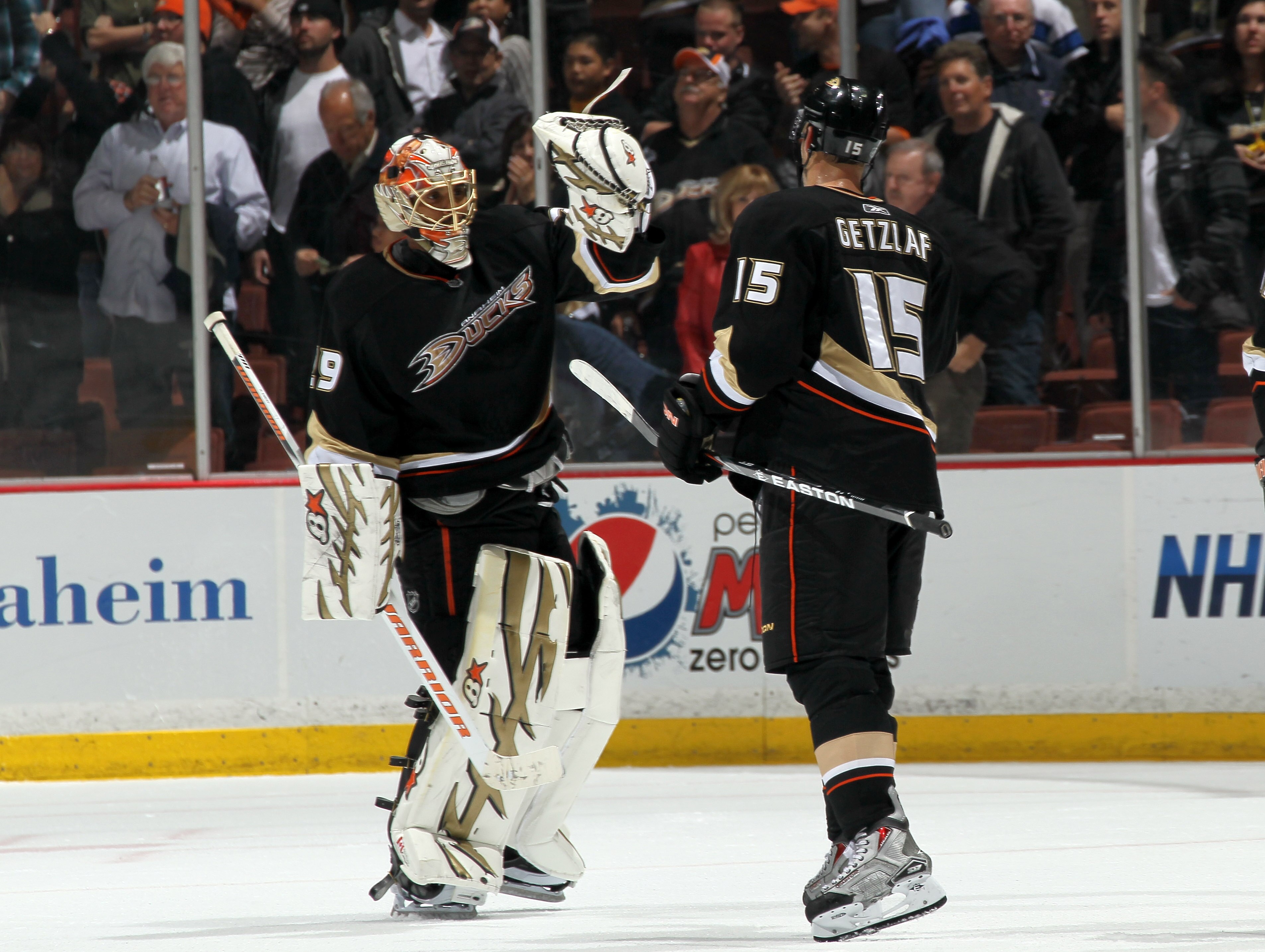 ANAHEIM, CA - MARCH 16:  Goalie Ray Emery #29 and Ryan Getzlaf #15 of the Anaheim Ducks celebrate after the game with the St. Louis Blues at Honda Center on March 16, 2011 in Anaheim, California.  Anaheim won 2-1.  (Photo by Stephen Dunn/Getty Images)