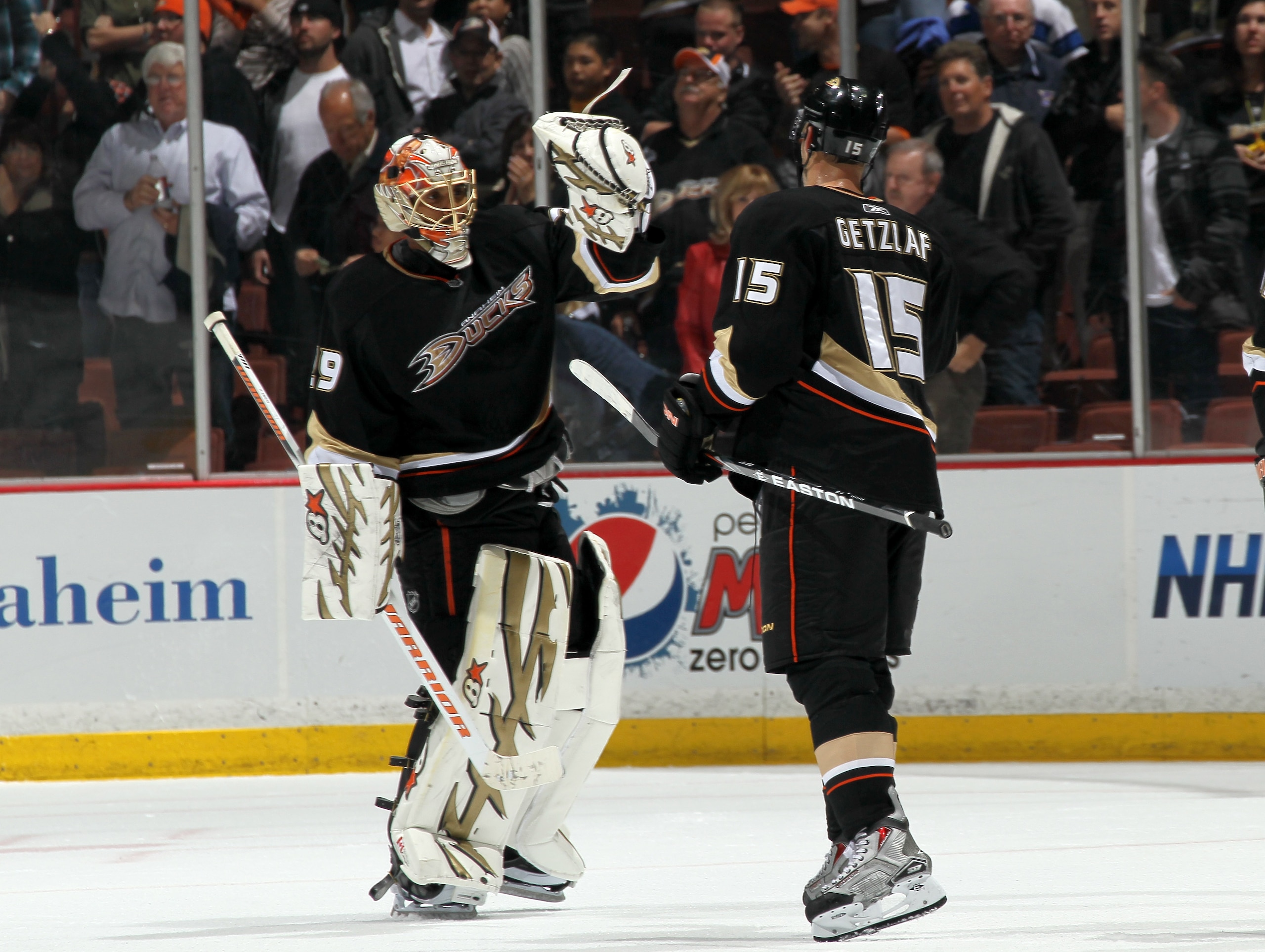 ANAHEIM, CA - MARCH 16:  Goalie Ray Emery #29 and Ryan Getzlaf #15 of the Anaheim Ducks celebrate after the game with the St. Louis Blues at Honda Center on March 16, 2011 in Anaheim, California.  Anaheim won 2-1.  (Photo by Stephen Dunn/Getty Images)