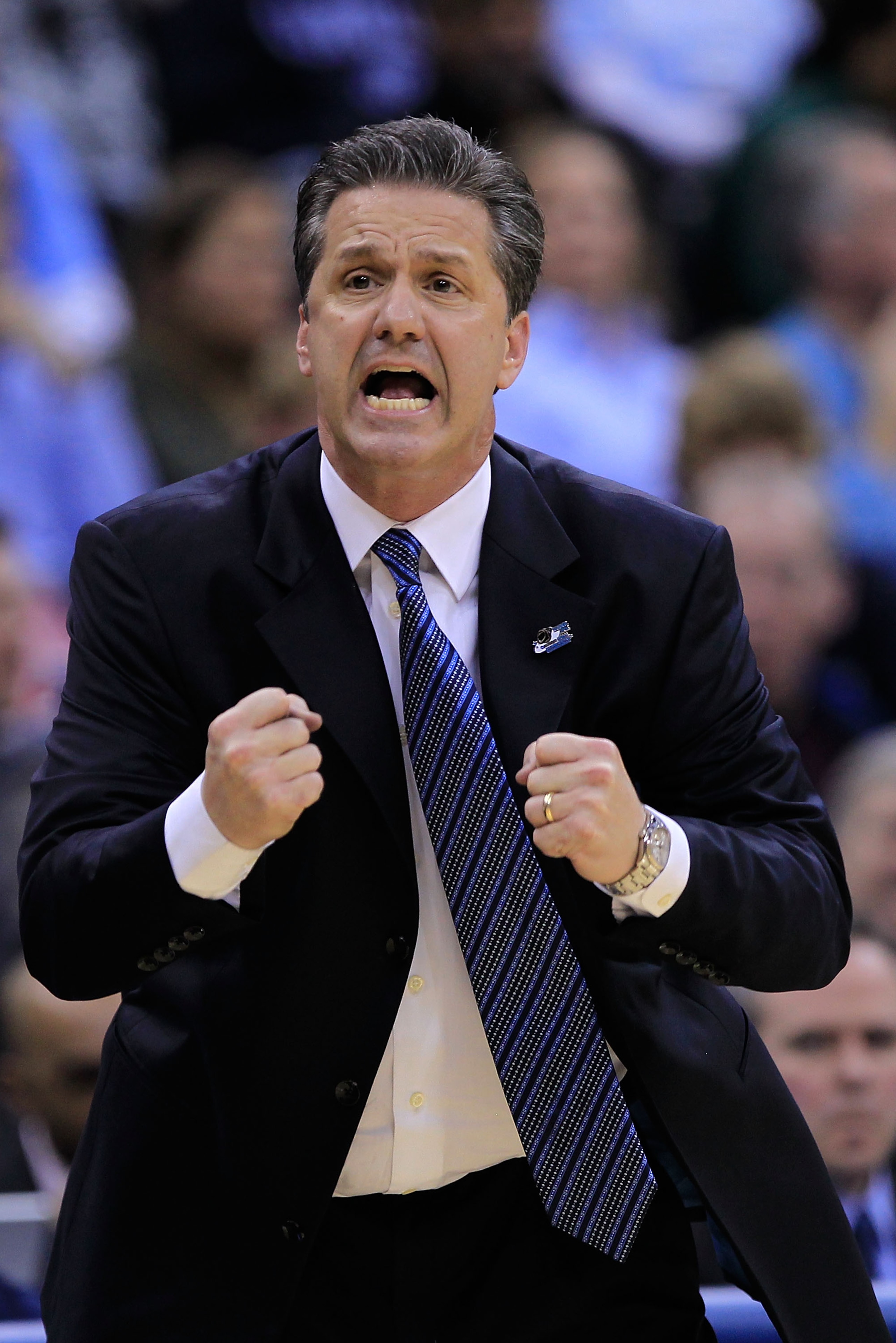 NEWARK, NJ - MARCH 27:  Head coach John Calipari of the Kentucky Wildcats reacts after a play against the North Carolina Tar Heels during the first half of the east regional final of the 2011 NCAA men's basketball tournament at Prudential Center on March