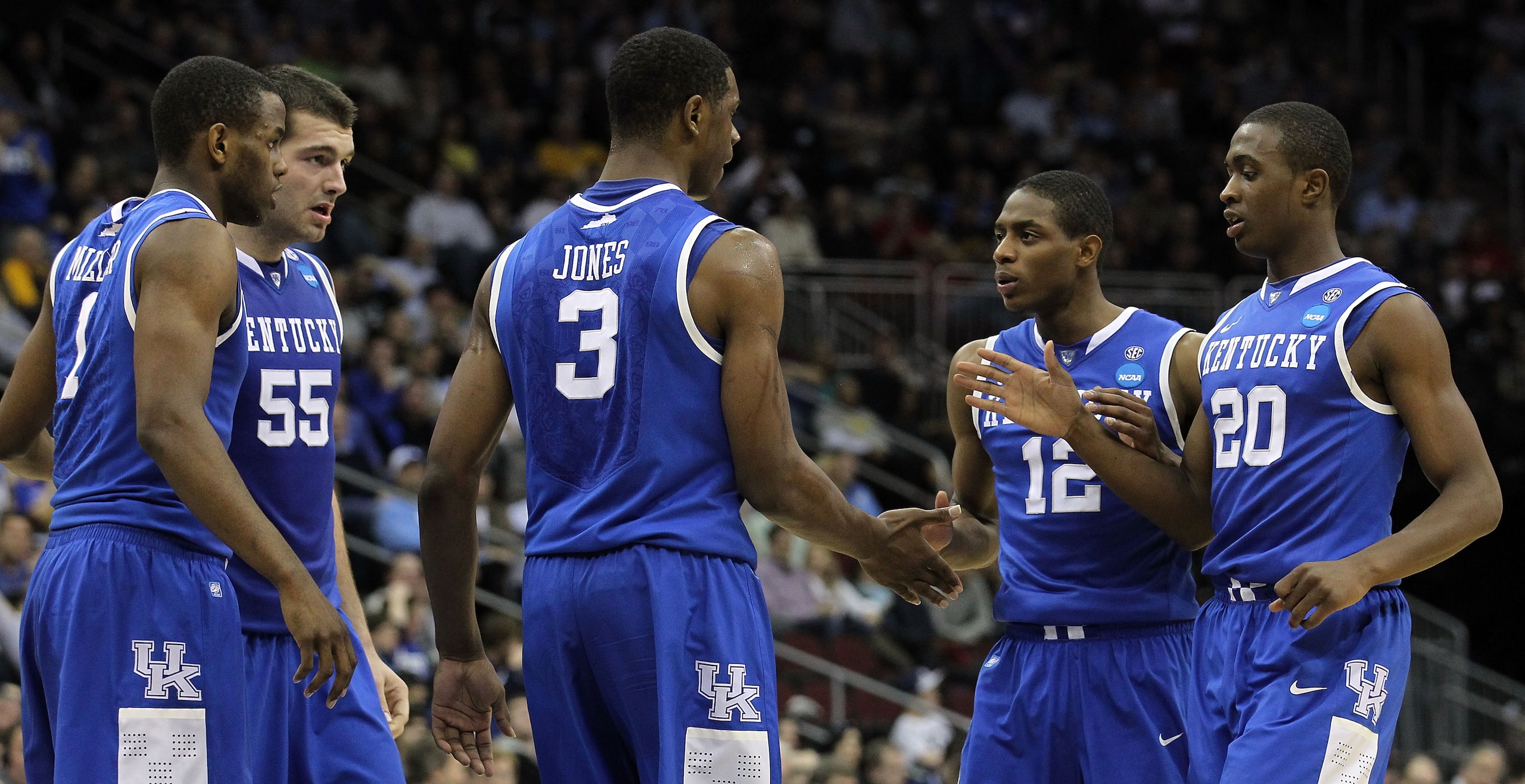 NEWARK, NJ - MARCH 27:  Terrence Jones #3 of the Kentucky Wildcats is congratulated by Brandon Knight #12, Doron Lamb #20 and DeAndre Liggins #34  during the first half of the game against the North Carolina Tar Heels in the east regional final of the 201