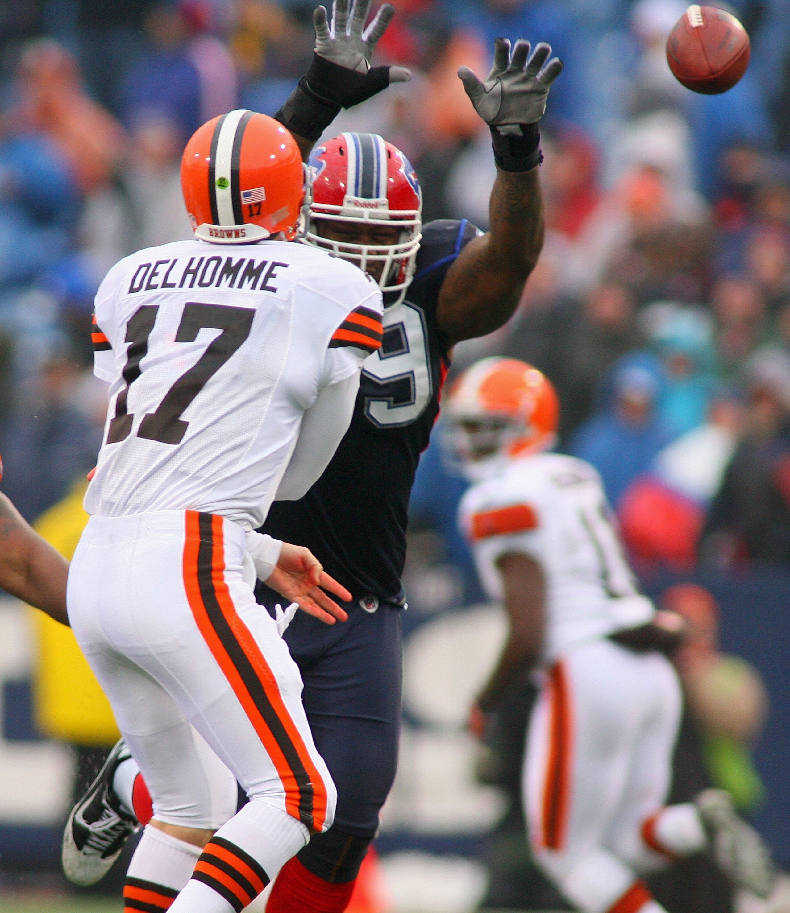 ORCHARD PARK, NY - DECEMBER 12: Jake Delhomme #17 of the Cleveland Browns throws a pass with pressure from Marcus Stroud #99 of the Buffalo Bills at Ralph Wilson Stadium on December 12, 2010 in Orchard Park, New York. (Photo by Rick Stewart/Getty Image ORCHARD PARK, NY - DECEMBER 12: Jake Delhomme #17 of the Cleveland Browns throws a pass with pressure from Marcus Stroud #99 of the Buffalo Bills at Ralph Wilson Stadium on December 12, 2010 in Orchard Park, New York. (Photo by Rick Stewart/Getty Image